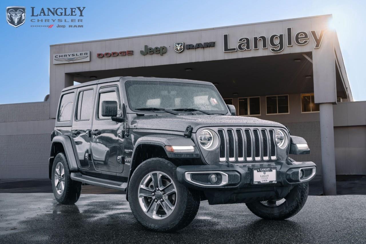 <p><strong>2020 Jeep Wrangler Unlimited Sahara 4x4</strong></p><p>The Sahara trim is designed as the most road-friendly and "civilized" version of the Wrangler Unlimited, offering a more premium interior and refined exterior styling without compromising its legendary Trail Rated® off-road DNA.</p><ul><li><p><strong>Engine</strong>: 3.6L Pentastar V6 (285 hp, 260 lb-ft torque) or 2.0L Turbo I-4 (270 hp, 295 lb-ft torque)</p></li><li><p><strong>Drivetrain</strong>: Command-Trac® Part-Time 4x4 with available Selec-Trac® Full-Time 4x4</p></li><li><p><strong>Max Towing</strong>: Up to 1,588 kg (3,500 lbs) when properly equipped</p></li><li><p><strong>Technology</strong>: 7-inch Uconnect® 4 touchscreen (available 8.4-inch with Navigation), Apple CarPlay/Android Auto, and a 7-inch digital driver information display</p></li><li><p><strong>Interior</strong>: Dual-zone automatic climate control, available leather-faced seats with Sahara logo, and a wash-out interior with removable carpet and drain plugs</p></li><li><p><strong>Key Features</strong>: 18-inch aluminum wheels with Tech Grey spokes, body-colour fender flares, side steps, and available Sky One-Touch Power Top</p></li></ul><p>Come book a test drive at Langley Chrysler, conveniently located in Langley, British Columbia.</p>

<p>*All prices plus applicable taxes, applicable environmental recovery charges, documentation of $599 and full tank of fuel surcharge of $76 if a full tank is chosen. <br />Other protection items available that are not included in the above price:<br />Tire & Rim Protection and Key fob insurance starting from $599<br />Service contracts (extended warranties) for coverage up to 7 years and 200,000 kms starting from $599<br />Custom vehicle accessory packages, mudflaps and deflectors, tire and rim packages, lift kits, exhaust kits and tonneau covers, canopies and much more that can be added to your payment at time of purchase<br />Undercoating, rust modules, and full protection packages starting from $199<br />Financing Fee of $500 when applicable<br />Flexible life, disability and critical illness insurances to protect portions of or the entire length of vehicle loan</p>