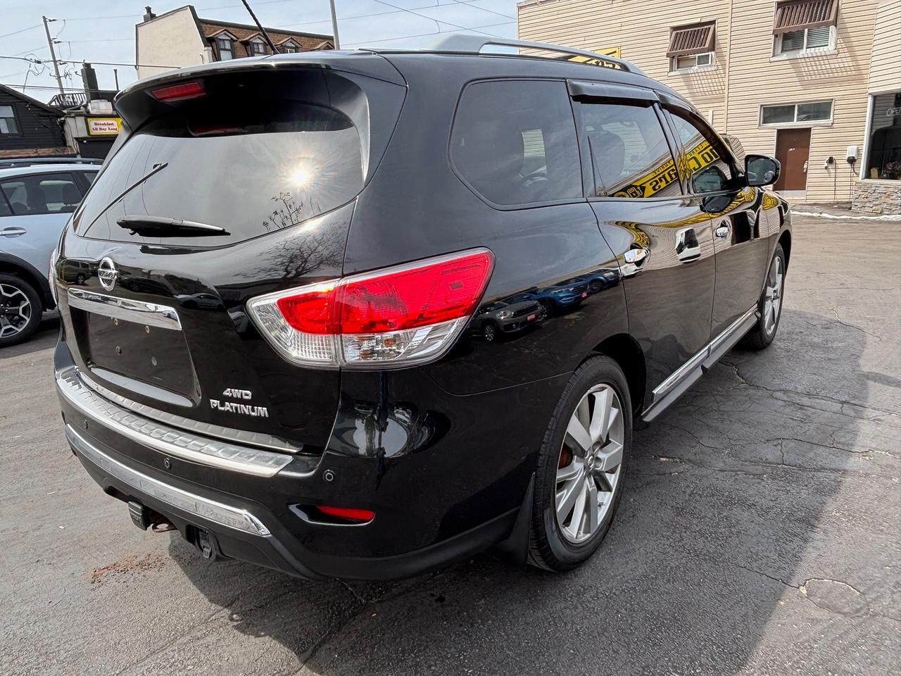 2016 Nissan Pathfinder Platinum Four Wheel Drive with 2 year warranty Photo