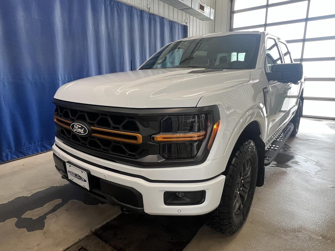 <p><strong>Experience the future of truck capability with the 2026 Ford F-150 Tremor.</strong> This cutting-edge pickup combines rugged performance with advanced technology, perfect for the modern adventurer.<br><br>- 3.5L V6 EcoBoost engine for impressive power and efficiency<br>- 4WD system with advanced terrain management<br>- Crew cab design comfortably seats 5 passengers<br>- SYNC 4 with wireless connectivity and 1-year trial of connected navigation<br>- 18 alloy wheels with dark matte finish and all-terrain tires<br>- Aerial View Camera System for enhanced visibility<br>- Collision Mitigation and Blind Spot Information System for added safety<br><br>Ready to elevate your driving experience? Reserve your 2026 F-150 Tremor today or contact Merit Ford Sales to schedule a test drive. Dont miss your chance to own the future of truck innovation.</p>