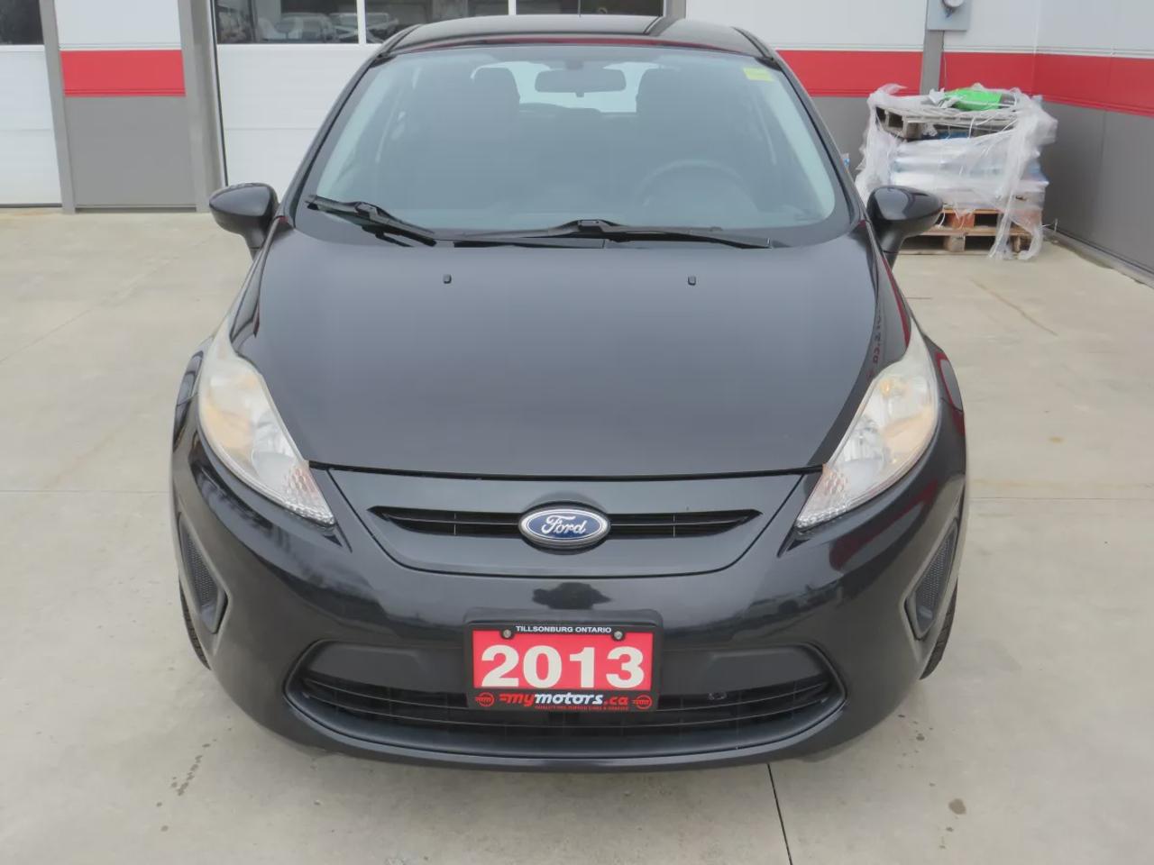 2013 Ford Fiesta SE | Safety Certified | Automatic | AC | Power Locks | Power Windows | Bluetooth | CD Player | Photo