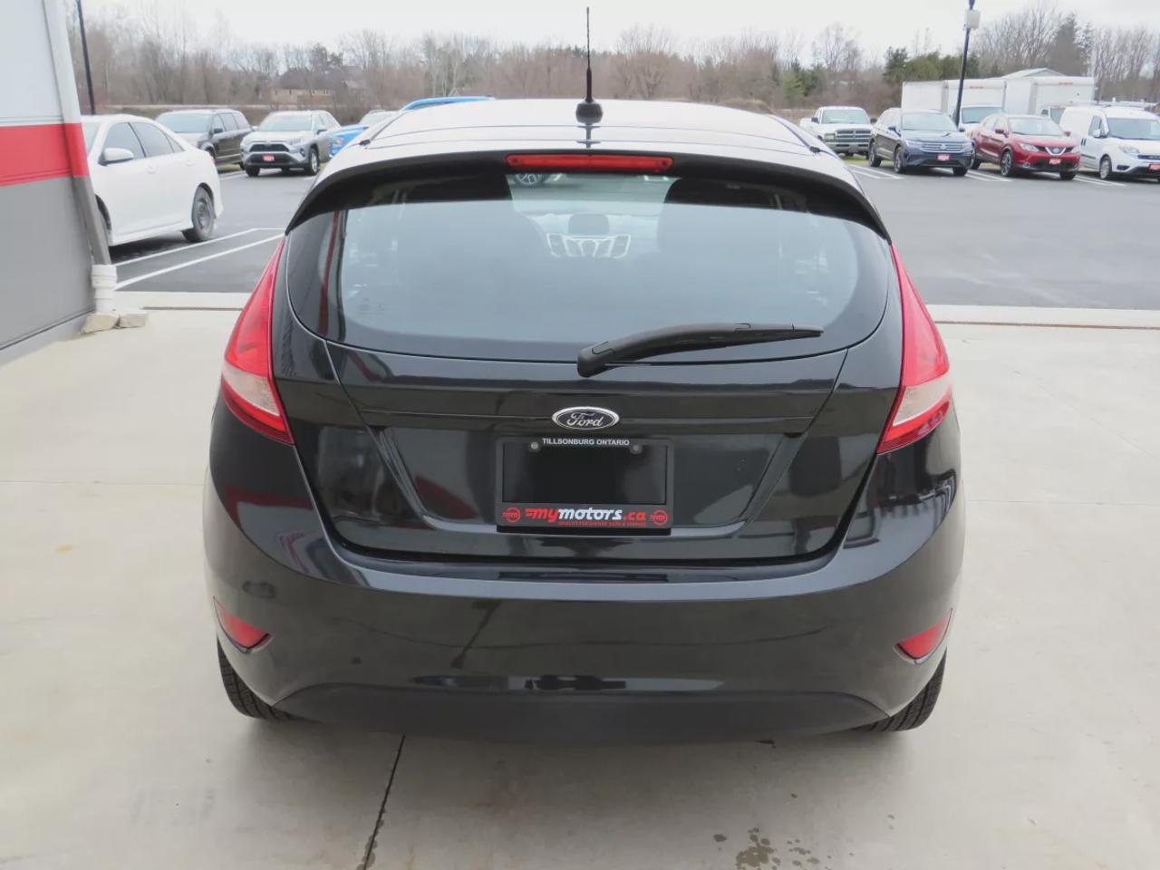 2013 Ford Fiesta SE | Safety Certified | Automatic | AC | Power Locks | Power Windows | Bluetooth | CD Player | Photo