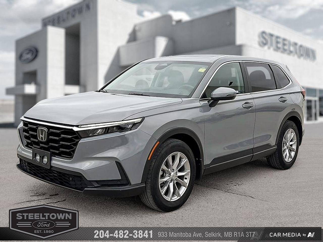 <b>Leather Seats,  Sunroof,  Power Liftgate,  Heated Seats,  Heated Steering Wheel!</b><br> <br> We value your TIME, we wont waste it or your gas is on us!   We offer extended test drives and if you cant make it out to us we will come straight to you!<br><br><br> <br>With a refreshed design and improved performance, look no further than this 2023 Honda CR-V for the best crossover SUV experience. This 2023 Honda CR-V is for sale today in Selkirk. <br> <br>A legend returns! For 2023, Honda completely revised the ubiquitous CR-V, with a host of performance, design and technological upgrades to give it an even bigger edge against rivals in the ever-heated crossover SUV segment. With roomy seating, wide-open sightlines, and sporty details throughout, the all-new interior of the 2023 CR-V makes it easy to settle in and enjoy the ride. Upgraded infotainment systems with even more active and passive safety systems ensure a serene and uncompromised ride in this SUV. This SUV has 71,288 km. Its Grey in colour. It has an Automatic transmission and is powered by a 190HP 1.5L 4 Cylinder Engine. <br> <br> Our CR-Vs trim level is EX-L. This CR-V EX-L features genuine leather upholstery, an express open/close sunroof, a power liftgate for rear cargo access, and a heated leather steering wheel, along with upgraded 18-inch aluminum wheels. With an all-wheel-drive system, this incredibly versatile and practical SUV features heated front seats, 60-40 folding split-bench rear seats, proximity keyless entry with push button start, adaptive cruise control, dual-zone climate control, remote engine start, and an upgraded 9-inch infotainment system with Apple CarPlay, Android Auto and Siri Eyes Free. Safety features include blind spot detection, front and rear collision mitigation, front pedestrian braking, lane keeping assist with lane departure warning, driver monitoring alert, and a rear camera. Additional features include front and rear cupholders, LED headlights with automatic high beams, USB-A/USB-C charging ports, and even more. This vehicle has been upgraded with the following features: Leather Seats, Sunroof, Power Liftgate, Heated Seats, Heated Steering Wheel, Apple CarPlay, Android Auto.<br> <br>To apply right now for financing use this link: <a href=http://www.steeltownford.com/?https://CreditOnline.dealertrack.ca/Web/Default.aspx?Token=bf62ebad-31a4-49e3-93be-9b163c26b54c&La target=_blank>http://www.steeltownford.com/?https://CreditOnline.dealertrack.ca/Web/Default.aspx?Token=bf62ebad-31a4-49e3-93be-9b163c26b54c&La</a><br><br> <br/><br> Buy this vehicle now for the lowest bi-weekly payment of <b>$252.73</b> with $0 down for 96 months @ 8.99% APR O.A.C. ( Plus applicable taxes -  Platinum Shield Protection & Tire Warranty included   / Total cost of borrowing $15126   ).  See dealer for details. <br> <br>Family owned and operated in Selkirk for 35 Years.  <br>Steeltown Ford is located just 20 minutes North of the Perimeter Hwy, with an onsite banking center that offers free consultations. <br>Ask about our special dealer rates available through all major banks and credit unions.<br><br><br>Steeltown Ford Protect Plus includes:<br>- Life Time Tire Warranty <br>Cars cost less in Selkirk <br><br>Dealer Permit # 1039<br><br><br> Come by and check out our fleet of 110+ used cars and trucks and 150+ new cars and trucks for sale in Selkirk.  o~o