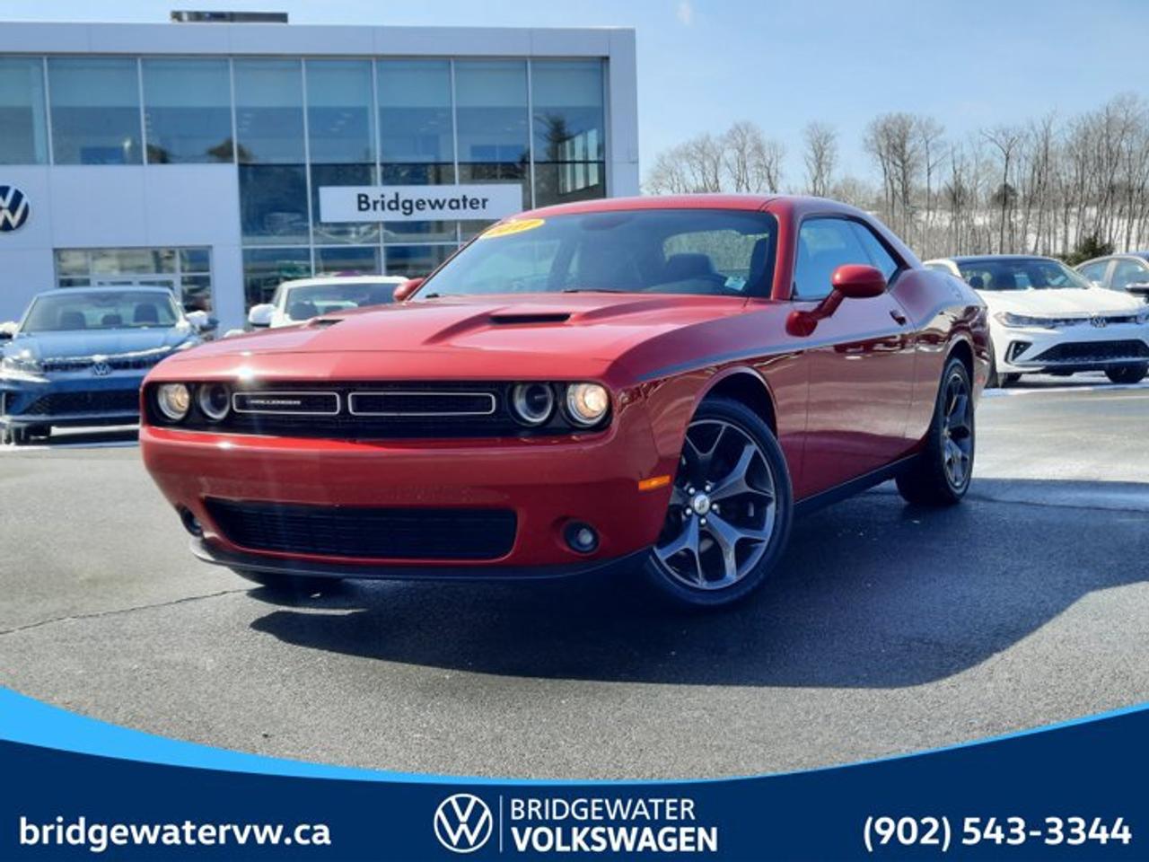 New Price! Recent Arrival! 2017 Dodge Challenger SXTThis vehicle has passed Motor Vehicle Inspection (MVI) and is road-ready for its next owner. It is being sold without warranty and has not undergone a manufacturer or dealership certification program. Reconditioning & Inspection Includes: Provincial Motor Vehicle Inspection (MVI) Safety-related repairs completed as required to meet inspection standards Basic mechanical and safety checks Final road test Any MVI-related concerns must be reported within the applicable time frame. Any inspection-related concerns must be reviewed and addressed by the original selling dealer.Odometer is 51316 kilometers below market average!Redline Red Tricoat Pearl RWD 8-Speed Automatic Pentastar 3.6L V6 VVT 1-Year SiriusXM Subscription, 276-Watt Amplifier, 3.07 Rear Axle Ratio, 4-Wheel Disc Brakes, 6 Speakers, 8.4 Touchscreen, ABS brakes, Air Conditioning, Alloy wheels, AM/FM radio, Anti-whiplash front head restraints, Auto-dimming Rear-View mirror, Automatic temperature control, Block heater, Body-Colour Rear Spoiler, Bodyside Stripes, Brake assist, Bright Pedals, Bumpers: body-colour, Cloth Seats w/Houndstooth Inserts, Compass, Delay-off headlights, Door Trim Panels w/Ambient Lighting, Driver door bin, Driver vanity mirror, Dual front impact airbags, Dual front side impact airbags, Electronic Stability Control, For SiriusXM Info Call 888-539-7474, Four wheel independent suspension, Front anti-roll bar, Front Bucket Seats, Front dual zone A/C, Front Heated Seats, Front reading lights, Front Ventilated Seats, Fully automatic headlights, GPS Antenna Input, Hands-Free Communication w/Bluetooth, Heated door mirrors, Heated Steering Wheel, Hectic Mesh Interior Accents, Illuminated entry, Leather Shift Knob, Leather-Faced Seats, Low tire pressure warning, Media Hub w/2 USB & Aux Input Jack, Nappa Leather-Faced Front Vented Seats, Nav-Ready, See Retailer for Details, Outside temperature display, Overhead airbag, Overhead console, Panic alarm, Park-Sense Rear Park Assist System, ParkView Rear Back-Up Camera, Passenger door bin, Passenger vanity mirror, Performance 4-Wheel Anti-Lock Disc Brakes, Power door mirrors, Power driver seat, Power steering, Power Sunroof, Power Tilt/Telescope Steering Column, Power windows, Quick Order Package 21V SXT Plus, Radio data system, Radio: Uconnect 3 w/5 Display, Radio: Uconnect 3C w/8.4 Display, Rear anti-roll bar, Rear reading lights, Rear window defroster, Remote keyless entry, Rhombi 2-Piece Wheel Centre Caps, Security system, SiriusXM Satellite Radio, Speed control, Speed-sensing steering, Split folding rear seat, Steering wheel mounted audio controls, Tachometer, Telescoping steering wheel, Tilt steering wheel, Traction control, Trip computer, Universal Garage Door Opener, Variably intermittent wipers, Wheels: 18 x 7.5 Satin Carbon Aluminum, Wheels: 20 x 8 Granite Crystal Aluminum.