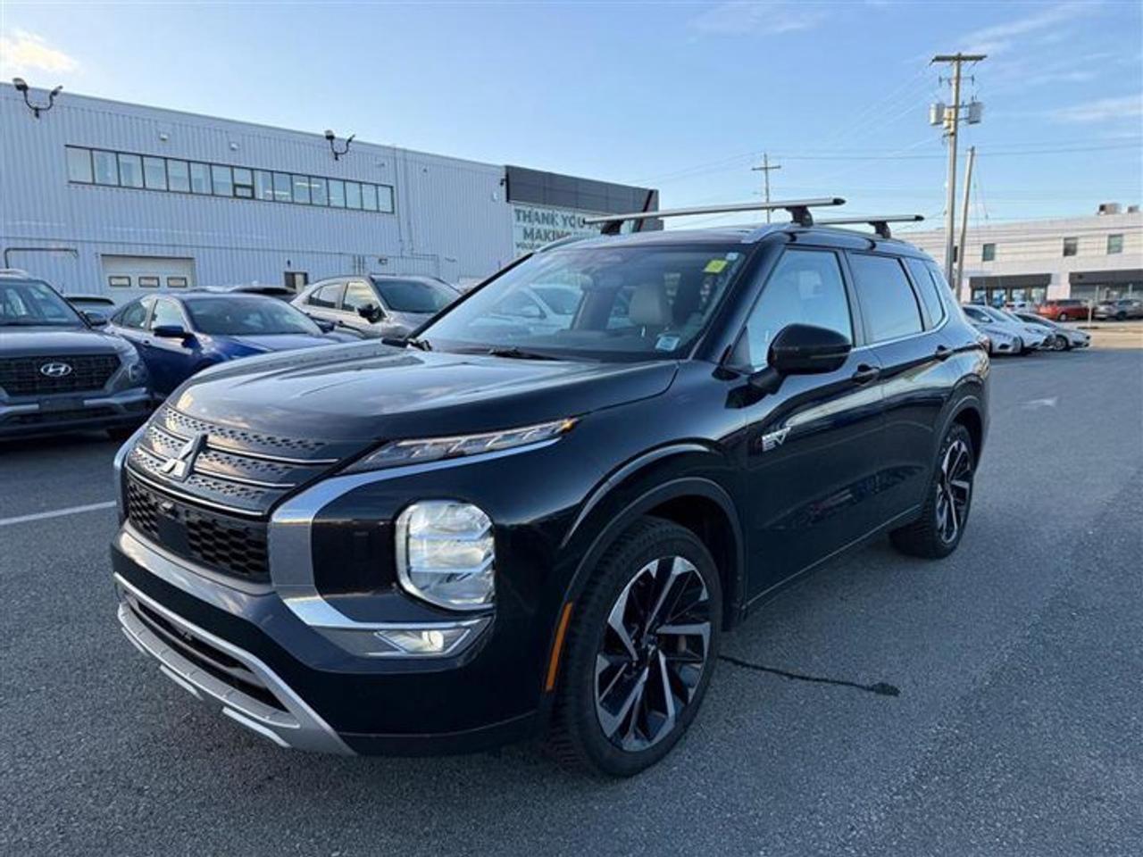 Recent Arrival! 2023 Mitsubishi Outlander PHEV SEL 2.4L I4 DOHC MIVEC, Alloy wheels, Dual front impact airbags, Dual front side impact airbags, Exterior Parking Camera Rear, Front fog lights, Heated front seats, Heated steering wheel, Navigation system: Powered by TOMTOM, Occupant sensing airbag, Overhead airbag, Power Liftgate, Power moonroof, Rear side impact airbag, Reclining 3rd row seat.CARFAX Canada No Reported AccidentsBlack Diamond 2023 Mitsubishi Outlander PHEV SEL 4WD 1-Speed Automatic 2.4L I4 DOHC MIVECSteele Mitsubishi has the largest and most diverse selection of preowned vehicles in HRM. Buy with confidence, knowing we use fair market pricing guaranteeing the absolute best value in all of our pre owned inventory!Steele Auto Group is one of the most diversified group of automobile dealerships in Canada, with 60 dealerships selling 29 brands and an employee base of well over 2300. Sales are up over last year and our plan going forward is to expand further into Atlantic Canada and the United States furthering our commitment to our Canadian customers as well as welcoming our new customers in the USA.
