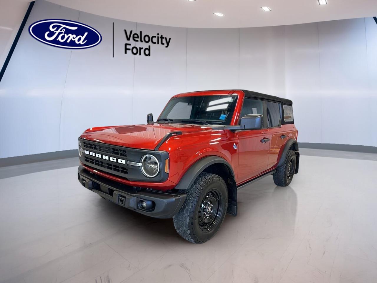Built for real adventure and ready for daily driving, this used 2022 Ford Bronco Black Diamond 4 Door 4x4 at Velocity Ford in Moose Jaw delivers classic Bronco character with practical capability. Finished in red with a dark grey interior, this SUV pairs a 2.3-litre unleaded engine with a 7-speed manual transmission for a more connected drive.

With 36,674 km on the odometer, this 2022 Ford Bronco Black Diamond 4 Door 4x4 offers the rugged utility many drivers want in a modern off-road SUV. Its four-door layout adds easy access for passengers and gear, while the convertible design brings open-air freedom when the road or trail calls.

FEATURES OF THE Bronco Black Diamond 4 Door 4x4

»» Heavy-duty off-road focused Black Diamond trim
»» Four-door body adds everyday practicality
»» Convertible design for open-air driving
»» Manual gearbox boosts driver engagement

ADVANCED SAFETY FEATURES

»» Backup camera helps with reversing confidence
»» Anti-lock braking system supports controlled stops
»» Stability control adds secure road handling
»» Side and head airbags add protection

PERFORMANCE AND EFFICIENCY

»» 2.3-litre engine delivers solid turbocharged performance
»» Seven-speed manual transmission feels engaging daily
»» Four-wheel drive supports traction off-road
»» Limited slip differential aids rough surfaces

COMFORT AND CONVENIENCE

»» Cruise control supports relaxed highway travel
»» Front air conditioning keeps cabin comfortable
»» Power windows add everyday convenience
»» Heated mirrors help in cold weather

TECHNONOLGY AND CONNECTIVITY

»» Bluetooth integration supports hands-free phone use
»» WiFi hotspot keeps devices better connected
»» Satellite radio adds more listening choice
»» Steering wheel audio controls feel convenient

CARGO SPACE

»» Rear trunk access simplifies loading gear
»» Four-door layout improves passenger flexibility
»» Spare tire supports remote travel confidence
»» Cabin fits people and adventure essentials

AWARDS & RECOGNITIONS

»» North American Utility Vehicle finalist, North American Car Awards, 2022
»» Best 4x4 and Pickup winner, The Car Guide, 2022

WHAT OTHER OWNERS LIKE

»» Removable roof adds fun open-air freedom
»» Strong off-road ability inspires driver confidence
»» Manual transmission feels rare and enjoyable
»» Rugged design suits active outdoor lifestyles

This Bronco feels honest, capable, and ready for work or play. The steel wheels, off-road tires, rear tow hook, LED headlamps, tinted windows, push button start, power steering, and automatic headlights all add useful value without overcomplicating the experience.

Inside, the layout is simple and practical, with an adjustable steering wheel, illuminated vanity mirrors, automatic door locks, and a leather-wrapped steering wheel that adds a refined touch. Electric mirrors, tire pressure monitoring, child safety locks, and a full set of airbags help make every trip easier and more reassuring.

For drivers who want true utility, removable-roof fun, and genuine four-wheel-drive confidence, this 2022 Ford Bronco Black Diamond 4 Door 4x4 stands out as a smart used SUV choice. It brings proven Bronco attitude, everyday usability, and trail-ready hardware together in one well-equipped package.

This 2022 Ford Bronco Black Diamond 4 Door 4x4s VIN is: 1FMDE5BH7NLB41524.