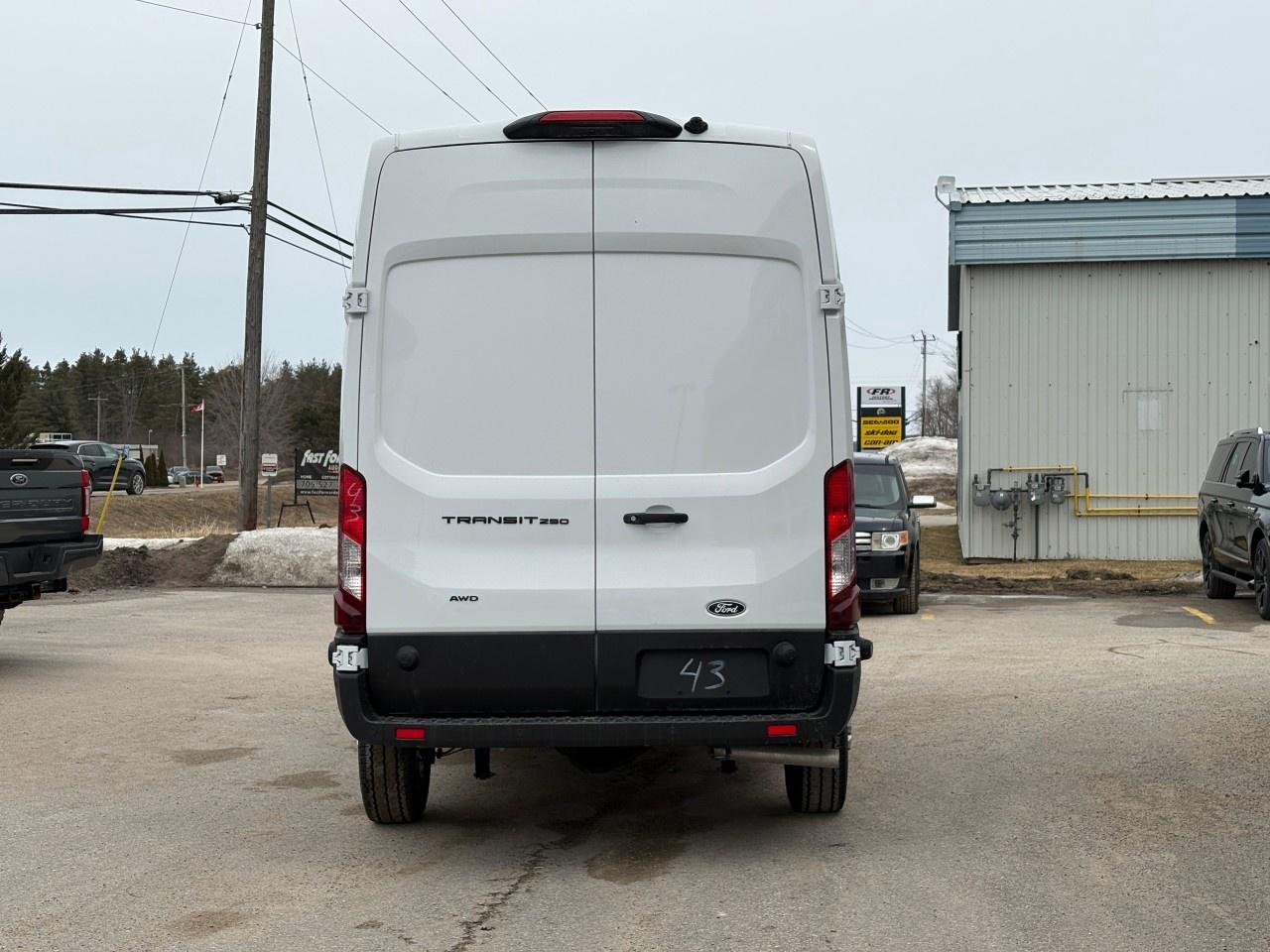 2026 Ford Transit Cargo Van T-250 148" HI RF 9070 GVWR AWD Photo