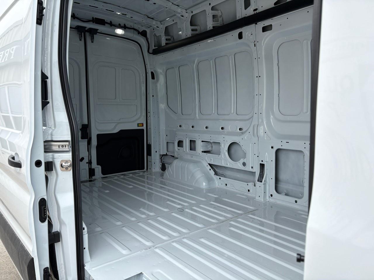 2026 Ford Transit Cargo Van T-250 148" HI RF 9070 GVWR AWD Photo