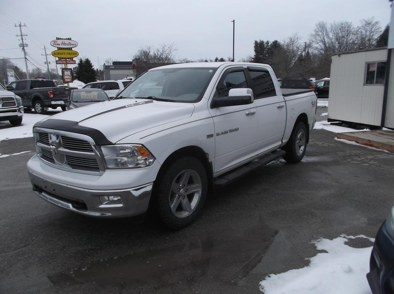 2012 Dodge Ram 1500 4X4 4 D00R SLT BIG HORN Photo