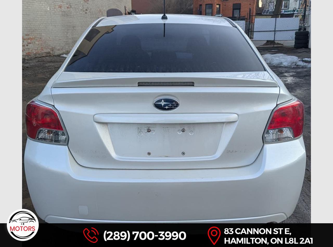 2012 Subaru Impreza 2.0i Touring AWD *No Accidents* *Certified  Photo