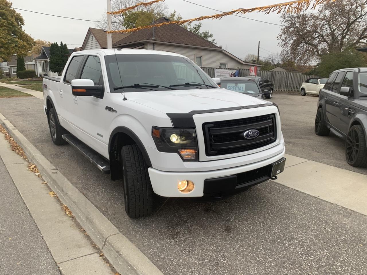 2014 Ford F-150 "" X,L.T. Fx4 **SUPERCREW CAB** Photo3