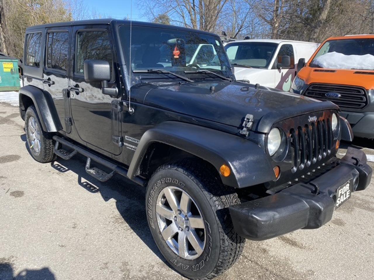 2011 Jeep Wrangler UNLIMITED SPORT Photo2
