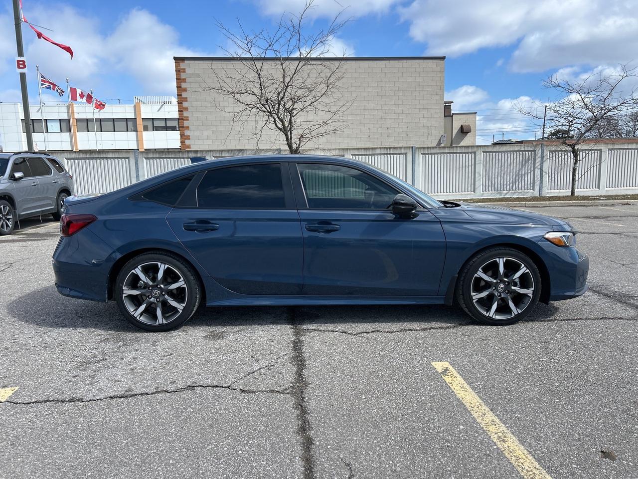 2025 Honda Civic Sedan Hybrid Sport Touring  Leather  Navi Roof Wireless Charger Photo