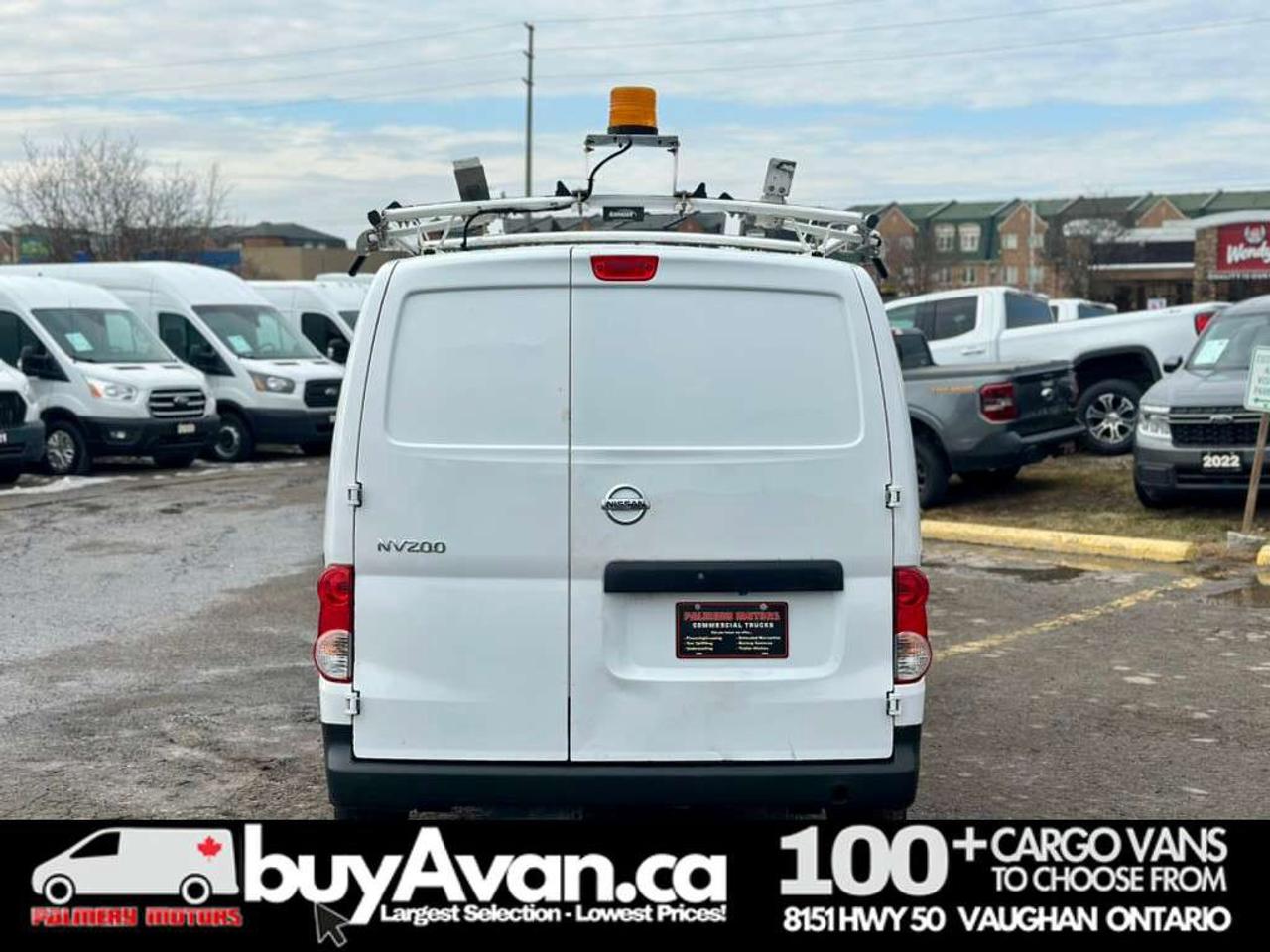 2019 Nissan NV200 SV + Divider Shelves Racks Photo