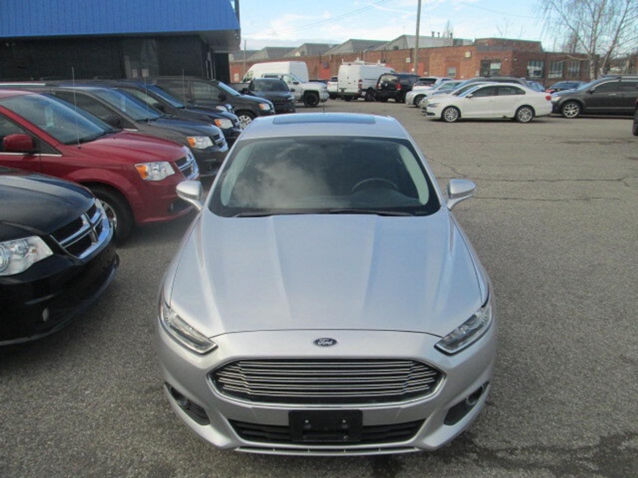 2016 Ford Fusion 4dr Sdn SE FWD, Sunroof, Navigation Photo