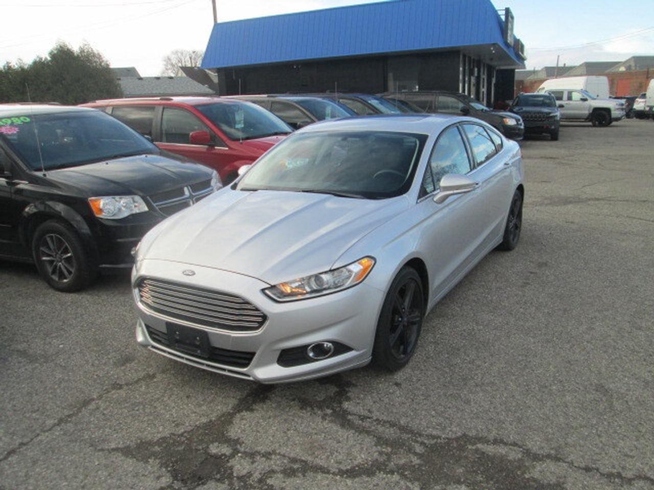 2016 Ford Fusion 4dr Sdn SE FWD, Sunroof, Navigation Photo