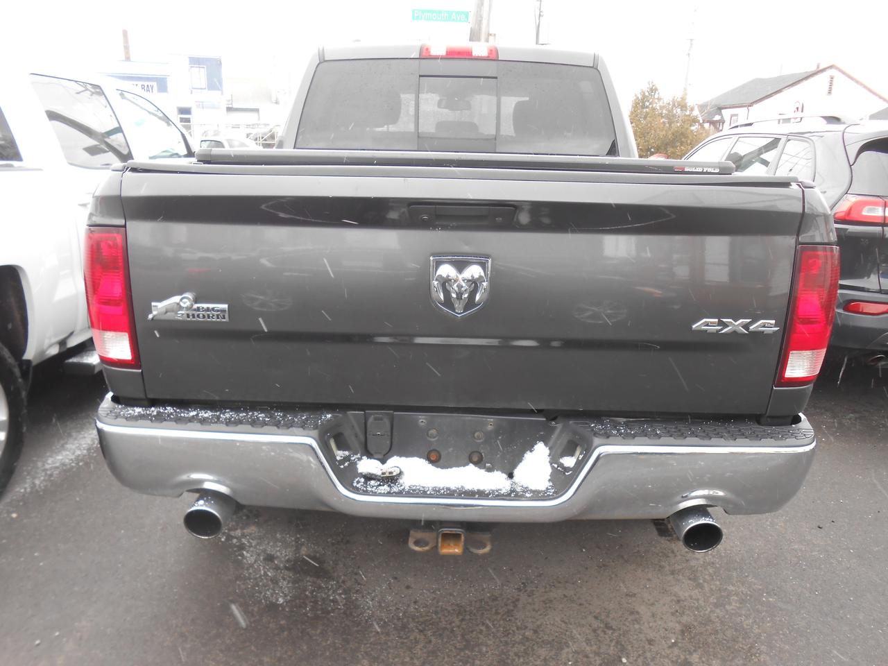 2014 RAM 1500 4WD Crew Cab 140.5  Big Horn ECO DIESEL Photo