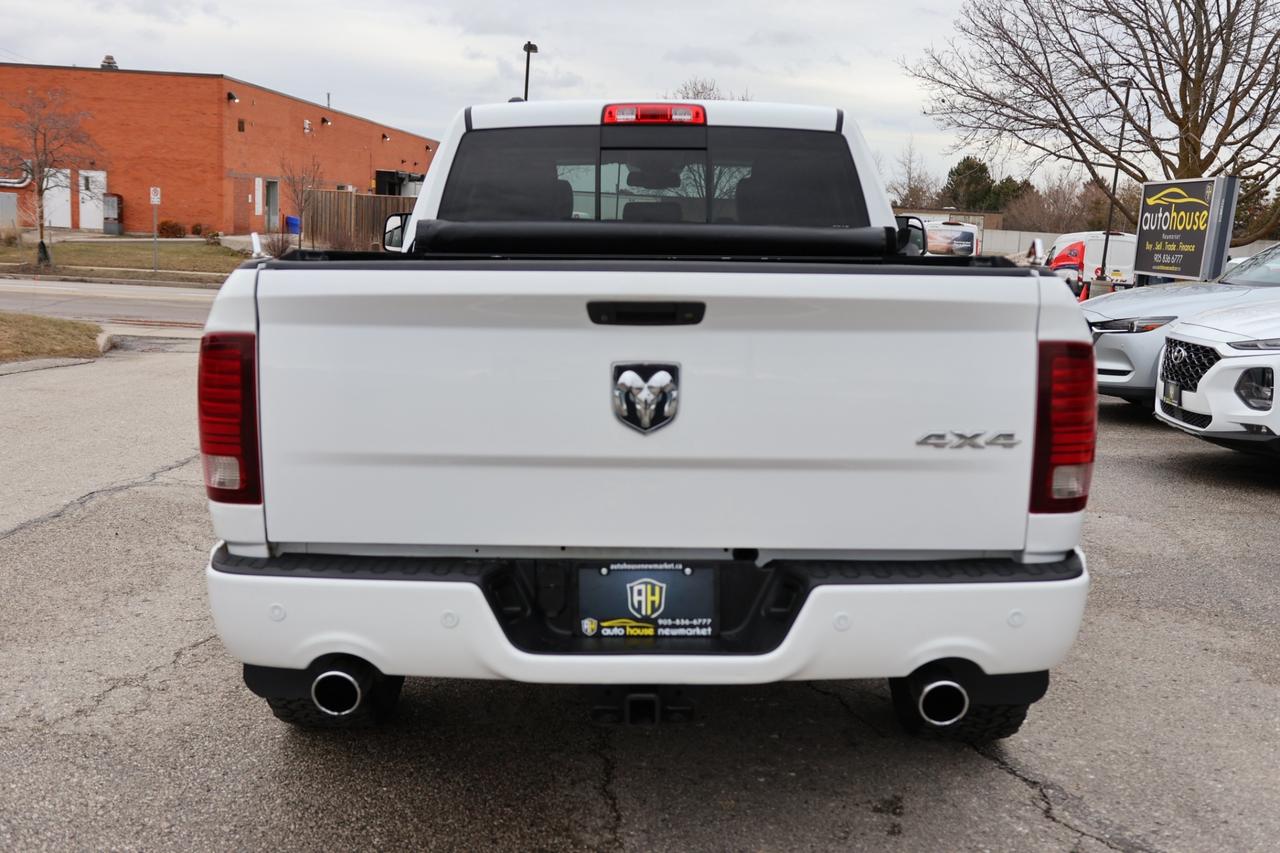 2016 RAM 1500 SPORT 4WD-5.7L HEMI/QUADCAB/R STARTER/NAV/BCAM/P S Photo