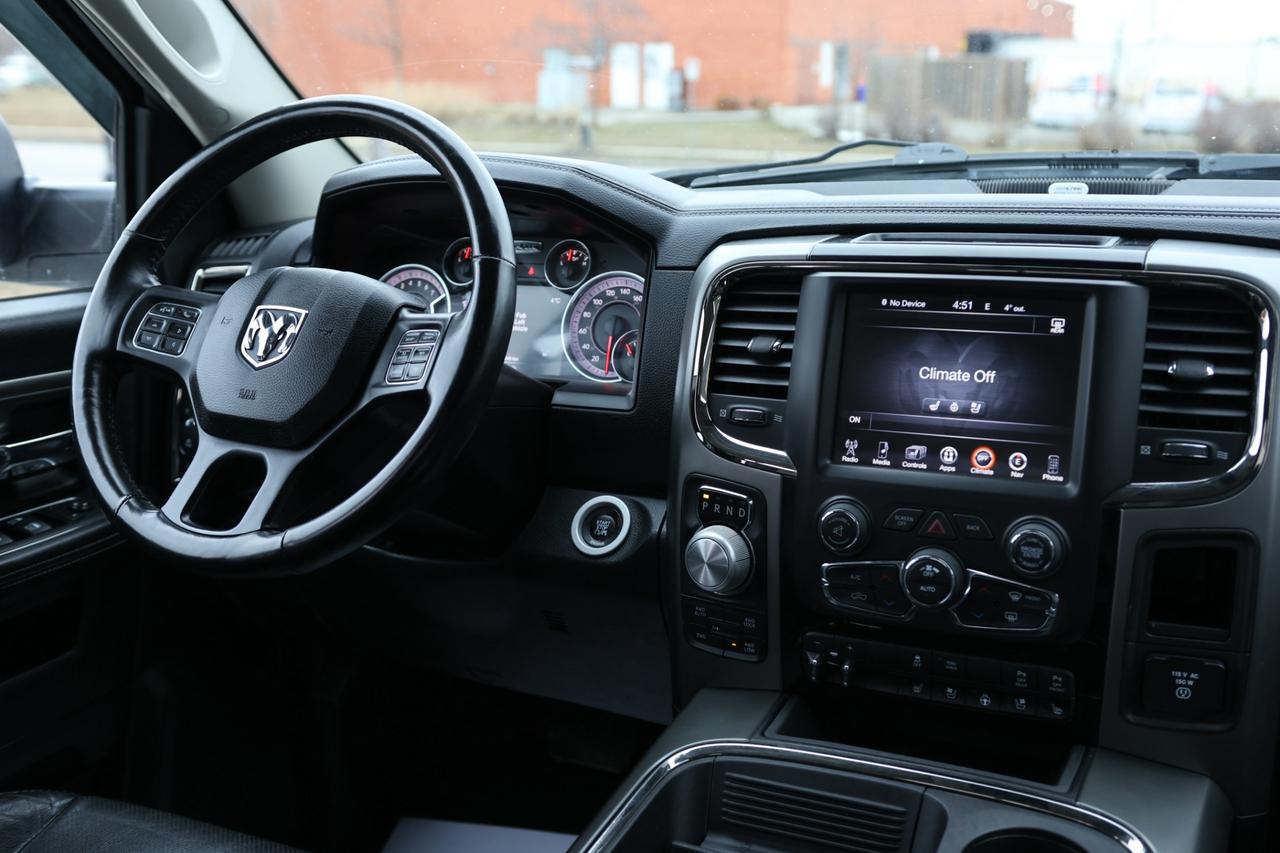 2016 RAM 1500 SPORT 4WD-5.7L HEMI/QUADCAB/R STARTER/NAV/BCAM/P S Photo