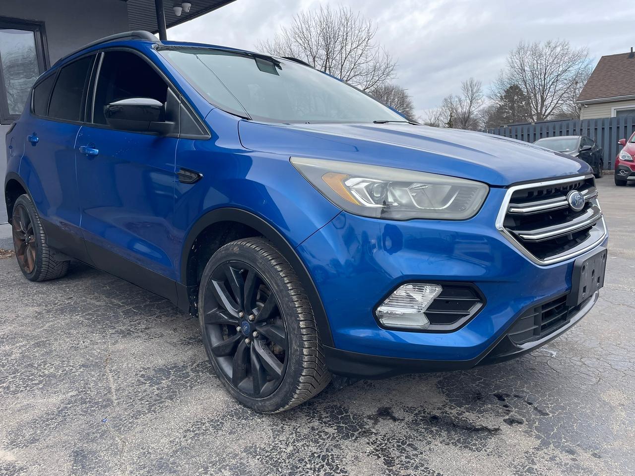 <p>CERTIFIED WITH 2 YEAR WARRANTY INCLUDED!!!</p><p><span style=color: #e2e5e9; font-family: Segoe UI Historic, Segoe UI, Helvetica, Arial, sans-serif; font-size: 15px; white-space-collapse: preserve; background-color: #252728;>Financing available for everyone with - Bad Credit - No Credit - Study Permit - Work Permit- Bankruptcy - Repos - First-time buyers - Consumer Proposal - Uber Drivers - ODSP ✅✅✅✅✅ ✅We Approve Everyone with all types of credit</span></p><p>WE FINANCE EVERYONE REGARDLESS OF CREDIT !!!</p><p>VOTED BRANTFORDS BEST USED CAR DEALER 2024 AND 2025 !!!!</p><p><span style=color: #3a3a3a; font-family: Roboto, sans-serif; font-size: 12px; background-color: #eeeeee;>Taxes, license are not included in listing price.</span></p><p><span style=text-decoration: underline;><strong><span style=color: rgb(58, 58, 58); font-family: Roboto, sans-serif; font-size: 12px; background-color: rgb(238, 238, 238); text-decoration: underline;><span style=color: rgb(58, 58, 58); font-family: Roboto, sans-serif; font-size: 12px; background-color: rgb(238, 238, 238); text-decoration: underline;>ENGINE </span>REBUILD at 223000km /// RUNS LIKE NEW</span></strong></span></p><p>Looking for a reliable and practical SUV? Check out this eye-catching 2017 Ford Escape SE, available now at Right Choice Auto! This versatile blue beauty boasts a sleek design and a comfortable black interior, perfect for both city commutes and weekend getaways. Powered by a fuel-efficient 4-cylinder engine and a smooth automatic transmission, this Escape is ready to take on the roads with ease. With its spacious cabin and convenient features, its an excellent choice for individuals, couples, or small families. This Escape has 225,000km on the odometer.</p><p>This 2017 Ford Escape SE is packed with features designed to enhance your driving experience. Heres a quick look at what makes this SUV stand out:</p><ul><li><strong>Fuel-sipping 4-cylinder engine:</strong> Save money at the pumps!</li><li><strong>Automatic Transmission:</strong> Enjoy effortless driving in any condition!</li><li><strong>Spacious Interior:</strong> Plenty of room for passengers and cargo!</li><li><strong>Front Wheel Drive:</strong> Provides great handling and control.</li><li><strong>Dependable Ford Reliability:</strong> Built to last!</li></ul><p><strong><em>Powered by AutoIntelligence&trade;</em></strong> Vehicle information has been generated using artificial intelligence and is provided for informational purposes only. While efforts are made to ensure accuracy, please confirm all details directly with the dealer.</p>