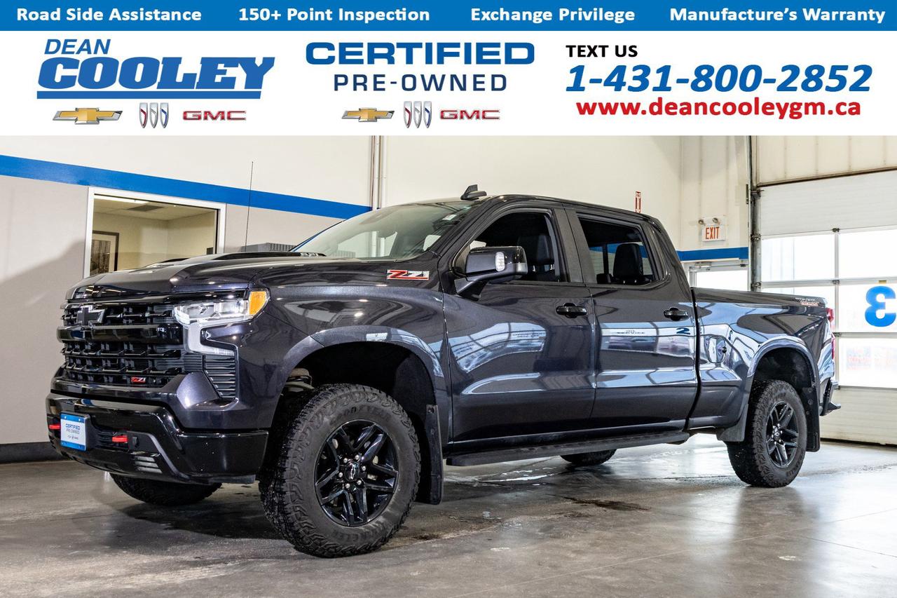 Remote Start, Heated Seats, HD Rear Camera, Keyless Entry, Satellite Radio, Power Steering, Multi-Zone A/C  In the bustling city of Dauphin, the 2022 Chevrolet Silverado 1500 LT Trail Boss stands out as a top choice for those seeking a robust crew cab pickup. This exceptional vehicle is equipped with a powerful Gas V8 6.2L engine, delivering a thrilling driving experience. The 10-Speed Automatic Transmission with Paddle Shifters ensures smooth and responsive handling, making it perfect for both city and off-road adventures.  The Silverado 1500 LT Trail Boss is designed with precision and comfort in mind. Its advanced features include a locking/limited slip differential, four-wheel drive capability, and aluminum wheels, providing outstanding traction and control on various terrains. Inside, enjoy comfort with climate control and a leather steering wheel, while the rear defrost and heated mirrors enhance visibility in colder conditions.  Safety is a top priority with lane keeping assist, lane departure warning, and front collision warning systems. The inclusion of smart device integration and a WiFi hotspot ensures you stay connected on the go. With its tow hitch and tow hooks, this Silverado is ready for any adventure you have in mind.  Dean Cooley GM has been serving the Parkland area since 1995, and we are proud to have contributed to the areas automotive needs for almost three decades. Specializing in Chevrolet, Buick, and GMC vehicles, along with certified pre-owned options, we take pride in matching you with the perfect vehicle to suit your needs. Our in-house financial experts are dedicated to simplifying the financing and leasing process, offering personalized solutions. At the heart of our operation lies our service department, complete with a cutting-edge collision and glass center. Here, we service all makes and models with meticulous precision and care. We also have a comprehensive parts department, stocked with essential parts, accessories, and tires all conveniently located under one roof. Visit us today at 1600 Main Street South in Dauphin and experience a new standard in the automotive industry.