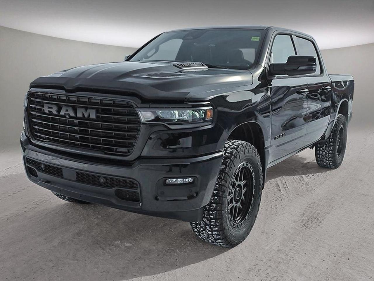 | CUSTOM TRUCK | 2 Mopar Lift Kit w/Fox 2.0 Shocks | 20 KMC Wheels | 35 FALKEN WILDPEAK A/T TIRESIntroducing the 2026 Ram 1500 Sport 4x4 Crew Cab  where bold performance meets luxury and cutting-edge technology. Dressed in sleek Black with matching leather-faced front bucket seats, this beast is powered by the legendary 5.7L HEMI VVT V8 engine with ETorque, paired with an 8-speed automatic transmission and a capable 3.92 rear axle ratio for impressive towing and payload capacity.Step inside to a tech-forward cabin featuring a massive 14.4 Uconnect touchscreen with navigation, dual wireless charging pads, ventilated and heated front seats, and an expansive dual-pane panoramic sunroof that floods the interior with natural light. Stay connected and entertained with a 19-speaker Harman/Kardon premium sound system and comprehensive smartphone integration including Apple CarPlay and Android Auto.Tow confidently with Trailer Brake Control and a Class IV hitch, while safety features like adaptive cruise control with stop-and-go, rain-sensing wipers, and a 360-degree camera system keep you secure on every journey. With power-adjustable pedals, memory settings for driver preferences, and hands-free phone communication, every drive is customized just for you.The 2026 Ram 1500 Sport 4x4 Crew Cab  engineered to dominate the road and deliver unparalleled comfort. Ready to experience power and sophistication in perfect harmony? Visit Aurora Dodge today or call to schedule your test drive!