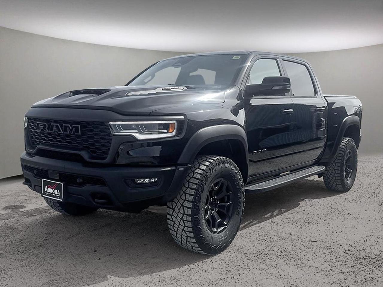Introducing the 2026 Ram 1500 RHO 4x4 Crew Cab  the ultimate blend of rugged capability and refined luxury. Powered by a 3.0L I6 HO Twin Turbo with ESS and backed by an 8-speed automatic transmission, this beast conquers any terrain with confidence. Outfitted in sleek Black with striking MOPAR RHO exterior and hood graphics, it commands attention on and off the road.Step inside to premium black leather bucket seats with suede and red accents, dual pane panoramic sunroof, and cutting-edge tech including a 14.4 Uconnect 5 Nav touchscreen, 19-speaker Harman/Kardon audio, head-up display, and hands-free Active Driving Assist. Versatility meets comfort with ventilated heated seats, power massages, and spacious rear seating.Built for tough jobs and weekend adventures, it features all-terrain tires, a class IV hitch, tri-fold soft tonneau cover, MOPAR off-road running boards, and locking cargo hooks  ready to tow and haul with a 3,538 kg GVWR. Safety? Advanced systems like Surround View Cameras, lane departure prevention, and pedestrian impact detection keep you confident every mile.Experience the unmatched combination of power, luxury, and technology in the 2026 Ram 1500 RHO. Call us today at 888-539-7474 to schedule your test drive and elevate your drive to the next level!PRICING ADVERTISED IS REFLECTING THE CASH INCENTIVE AND CANNOT BE STACKED WITH LOW RATE FINANCING, PRICING ADVERTISED CAN BE FINANCED. REACH OUT TO THE SALES TEAM TO GET YOUR QUOTE TAILORED TO HOW YOU WOULD LIKE TO BUY