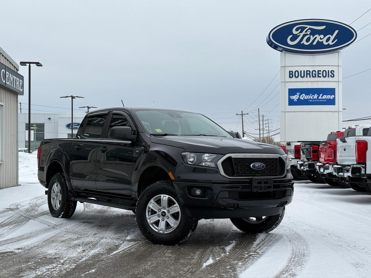 <p>The 2020 Ford Ranger XLT in Black, featuring a rugged 4×4 drivetrain, provides impressive handling whether you're cruising on highways or navigating off-road trails. With its bold exterior color and solid Truck build, it offers a commanding presence thats sure to turn heads.</p><p>The interior of the XLT 4WD SuperCrew offers a spacious and comfortable environment adorned in matching Black, crafted to make every journey enjoyable. This trim features a 5' box, ideal for both work and play, allowing you to carry whatever you need with ease.</p><p>Equipped with modern technology and features such as a backup camera, keyless entry, Bluetooth connection, and a smart device integration, you'll always be connected and in control. Safety on the road is paramount with advanced features like brake assist, lane assist, parking sensors, and a Wi-Fi hotspot, ensuring peace of mind for you and your passengers.</p><p>If you're an adventurous spirit who desires capability without sacrificing style and technology, the 2020 Ford Ranger XLT is designed with you in mind. Contact our dealership today to learn more and arrange a test drive.</p>