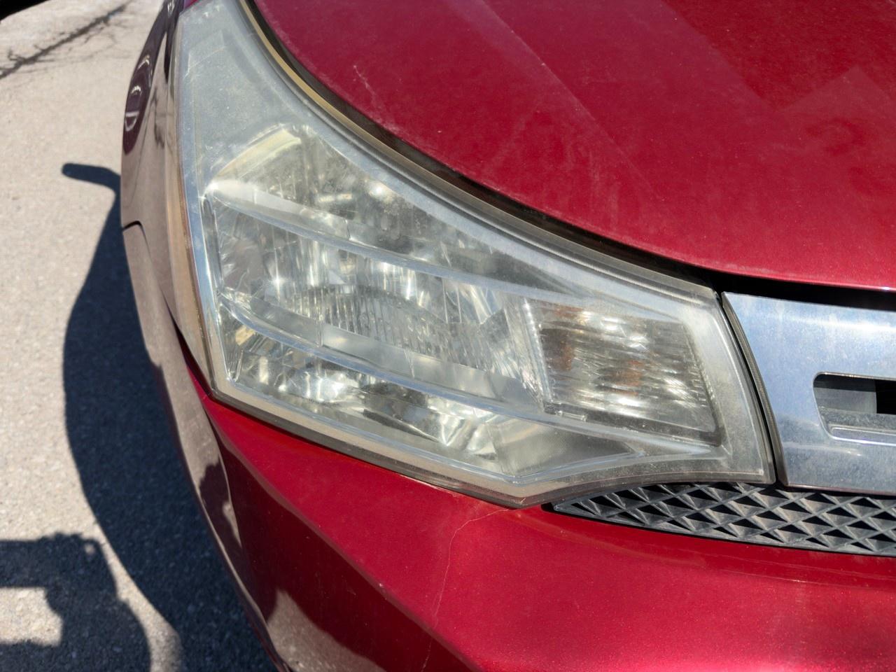 2010 Ford Focus SANGRIA RED METALLIC | CHARCOAL BLACK CLOTH SEAT TRIM | 2.0L DOHC I4 DURATEC ENG | 4-SPEED A/T W/OD Photo