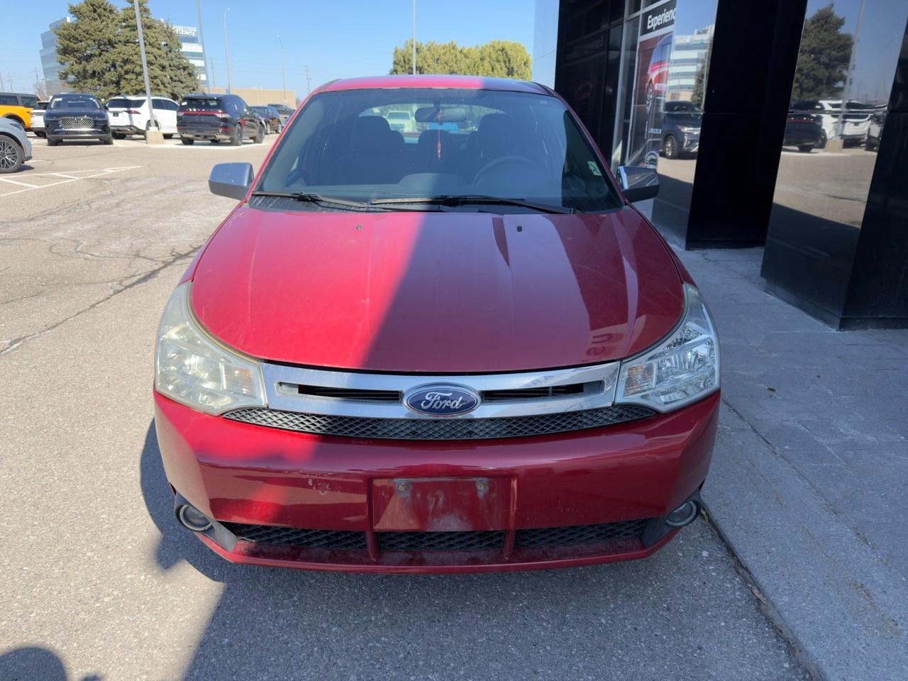 2010 Ford Focus SANGRIA RED METALLIC | CHARCOAL BLACK CLOTH SEAT TRIM | 2.0L DOHC I4 DURATEC ENG | 4-SPEED A/T W/OD Photo