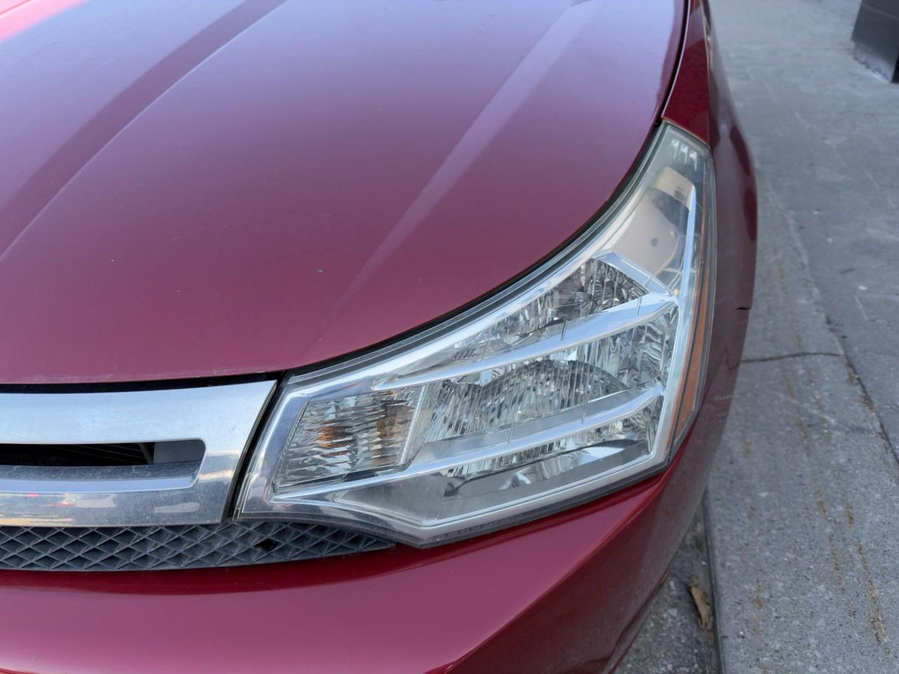 2010 Ford Focus SANGRIA RED METALLIC | CHARCOAL BLACK CLOTH SEAT TRIM | 2.0L DOHC I4 DURATEC ENG | 4-SPEED A/T W/OD Photo