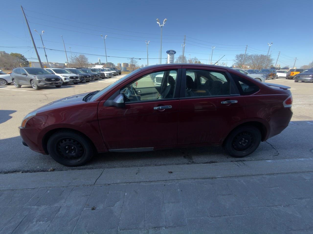 2010 Ford Focus SANGRIA RED METALLIC | CHARCOAL BLACK CLOTH SEAT TRIM | 2.0L DOHC I4 DURATEC ENG | 4-SPEED A/T W/OD Photo