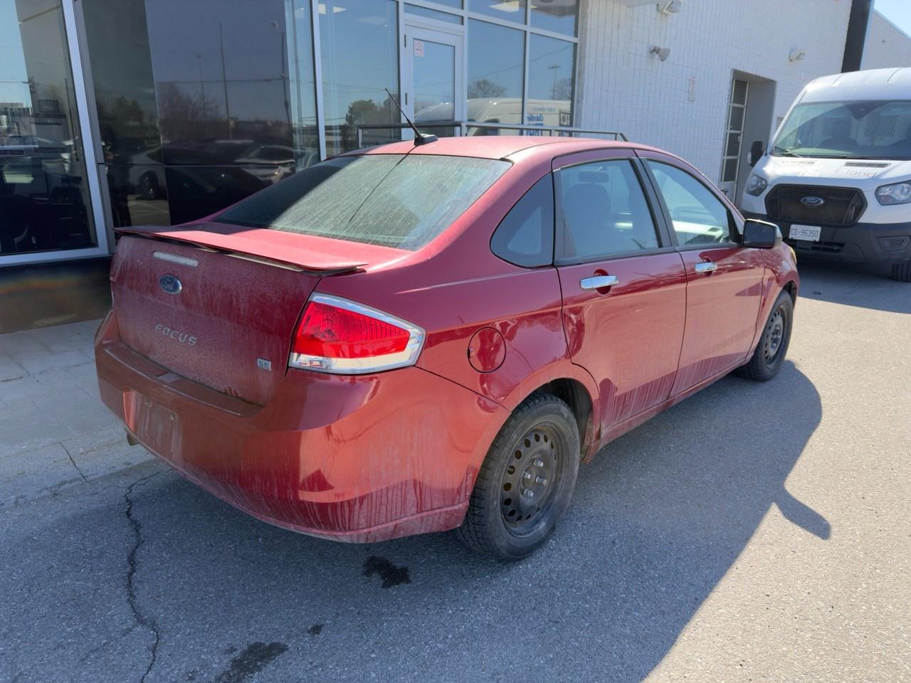 2010 Ford Focus SANGRIA RED METALLIC | CHARCOAL BLACK CLOTH SEAT TRIM | 2.0L DOHC I4 DURATEC ENG | 4-SPEED A/T W/OD Photo