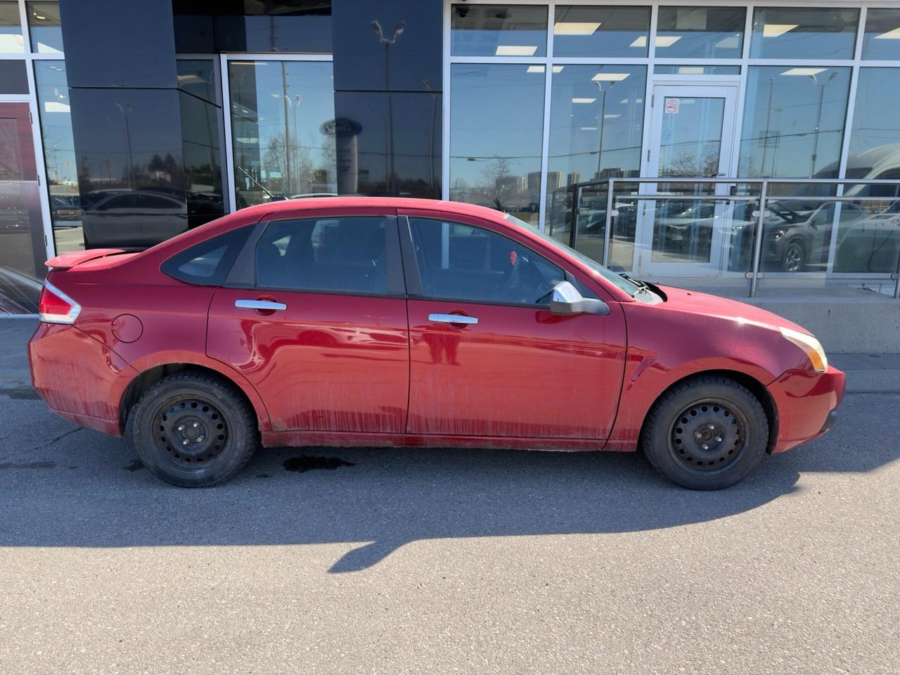 2010 Ford Focus SANGRIA RED METALLIC | CHARCOAL BLACK CLOTH SEAT TRIM | 2.0L DOHC I4 DURATEC ENG | 4-SPEED A/T W/OD Photo