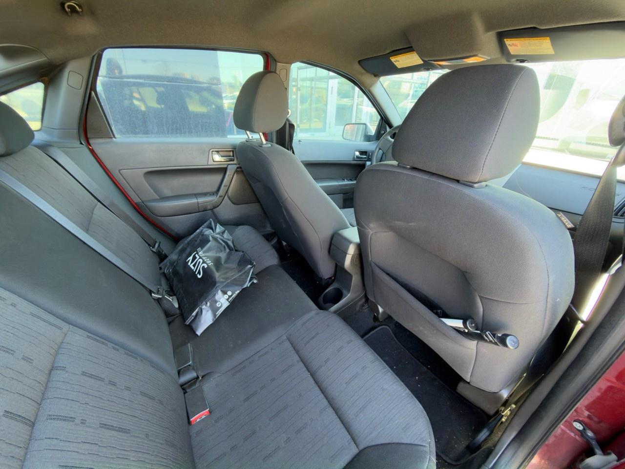 2010 Ford Focus SANGRIA RED METALLIC | CHARCOAL BLACK CLOTH SEAT TRIM | 2.0L DOHC I4 DURATEC ENG | 4-SPEED A/T W/OD Photo