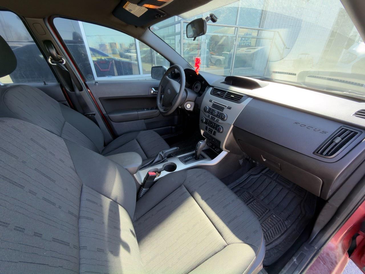 2010 Ford Focus SANGRIA RED METALLIC | CHARCOAL BLACK CLOTH SEAT TRIM | 2.0L DOHC I4 DURATEC ENG | 4-SPEED A/T W/OD Photo