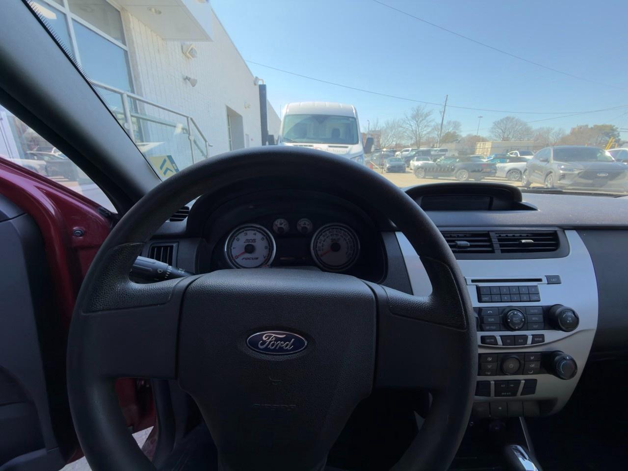 2010 Ford Focus SANGRIA RED METALLIC | CHARCOAL BLACK CLOTH SEAT TRIM | 2.0L DOHC I4 DURATEC ENG | 4-SPEED A/T W/OD Photo