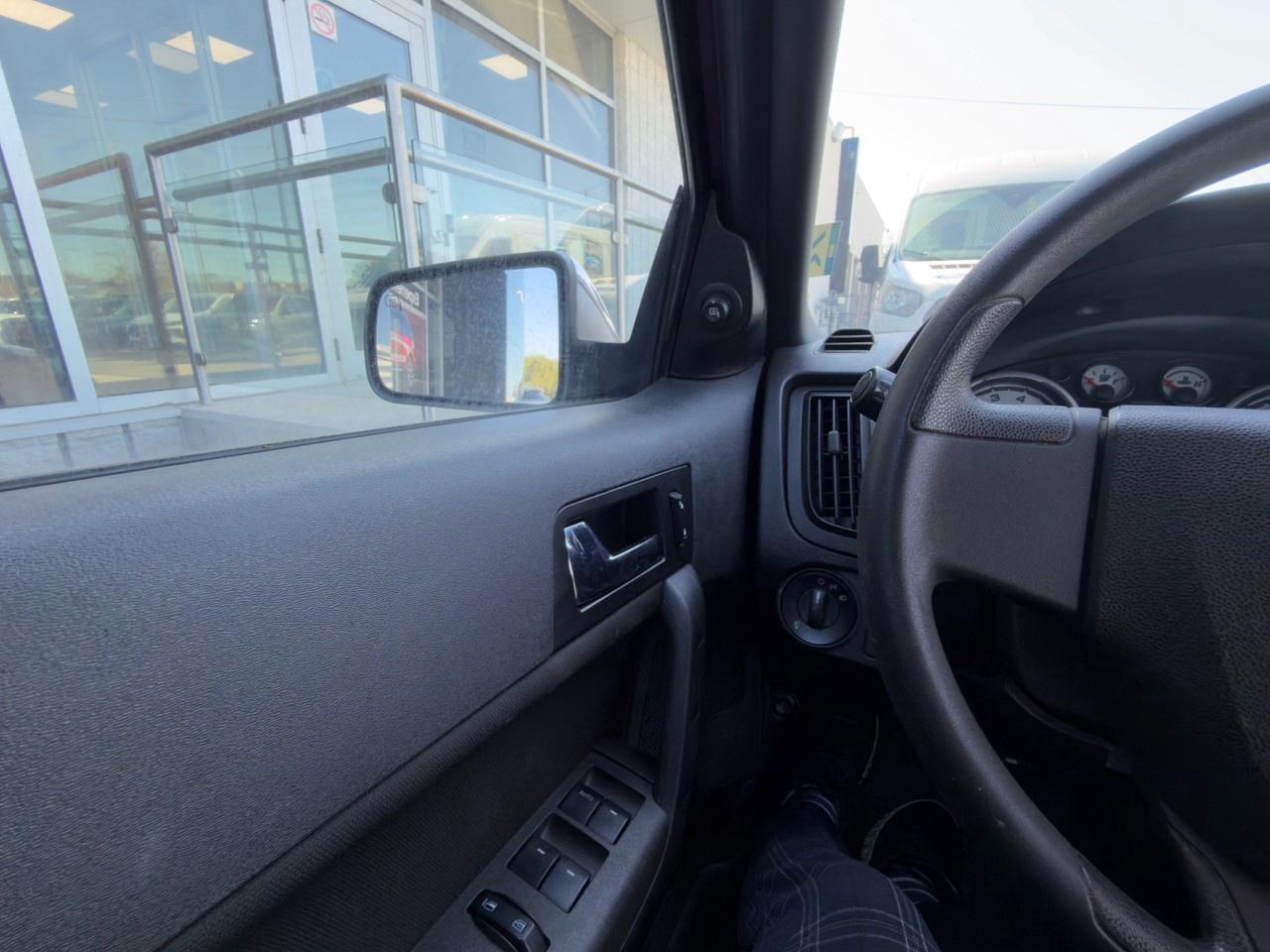 2010 Ford Focus SANGRIA RED METALLIC | CHARCOAL BLACK CLOTH SEAT TRIM | 2.0L DOHC I4 DURATEC ENG | 4-SPEED A/T W/OD Photo