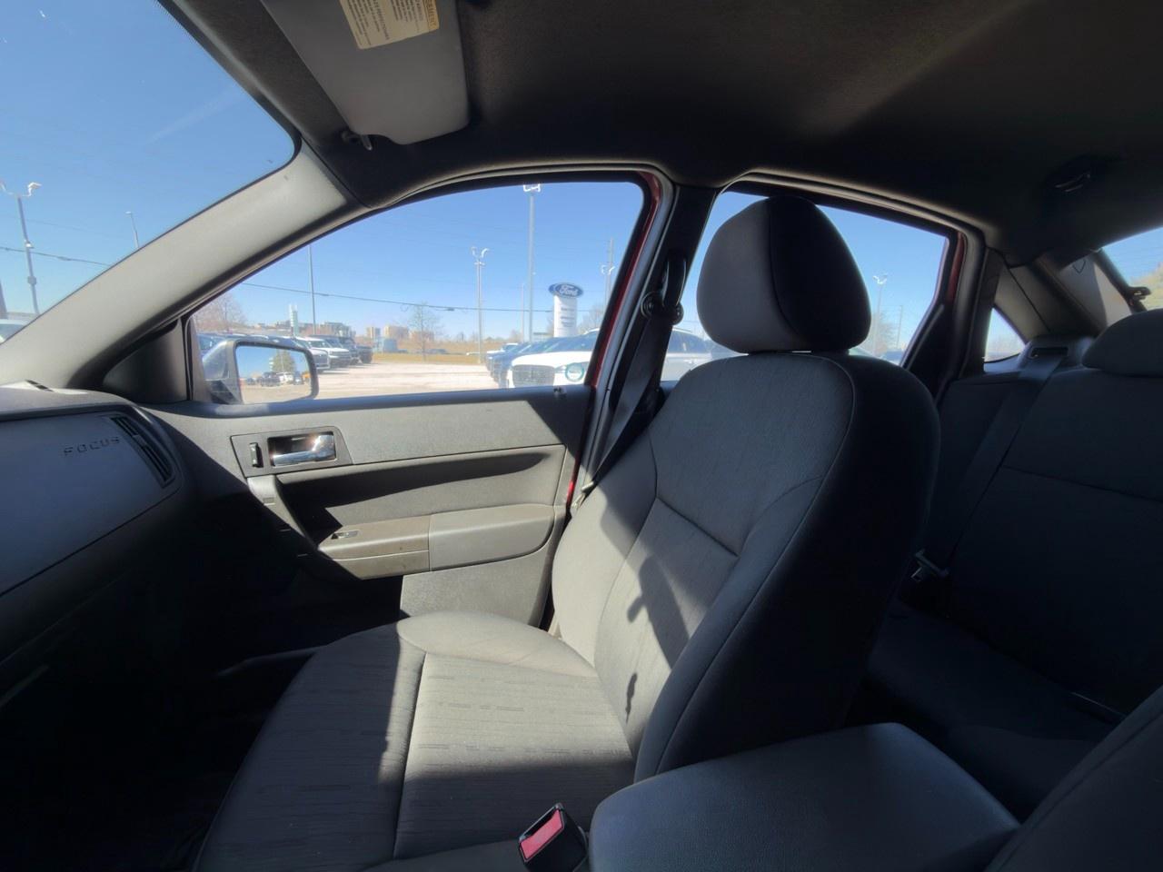 2010 Ford Focus SANGRIA RED METALLIC | CHARCOAL BLACK CLOTH SEAT TRIM | 2.0L DOHC I4 DURATEC ENG | 4-SPEED A/T W/OD Photo