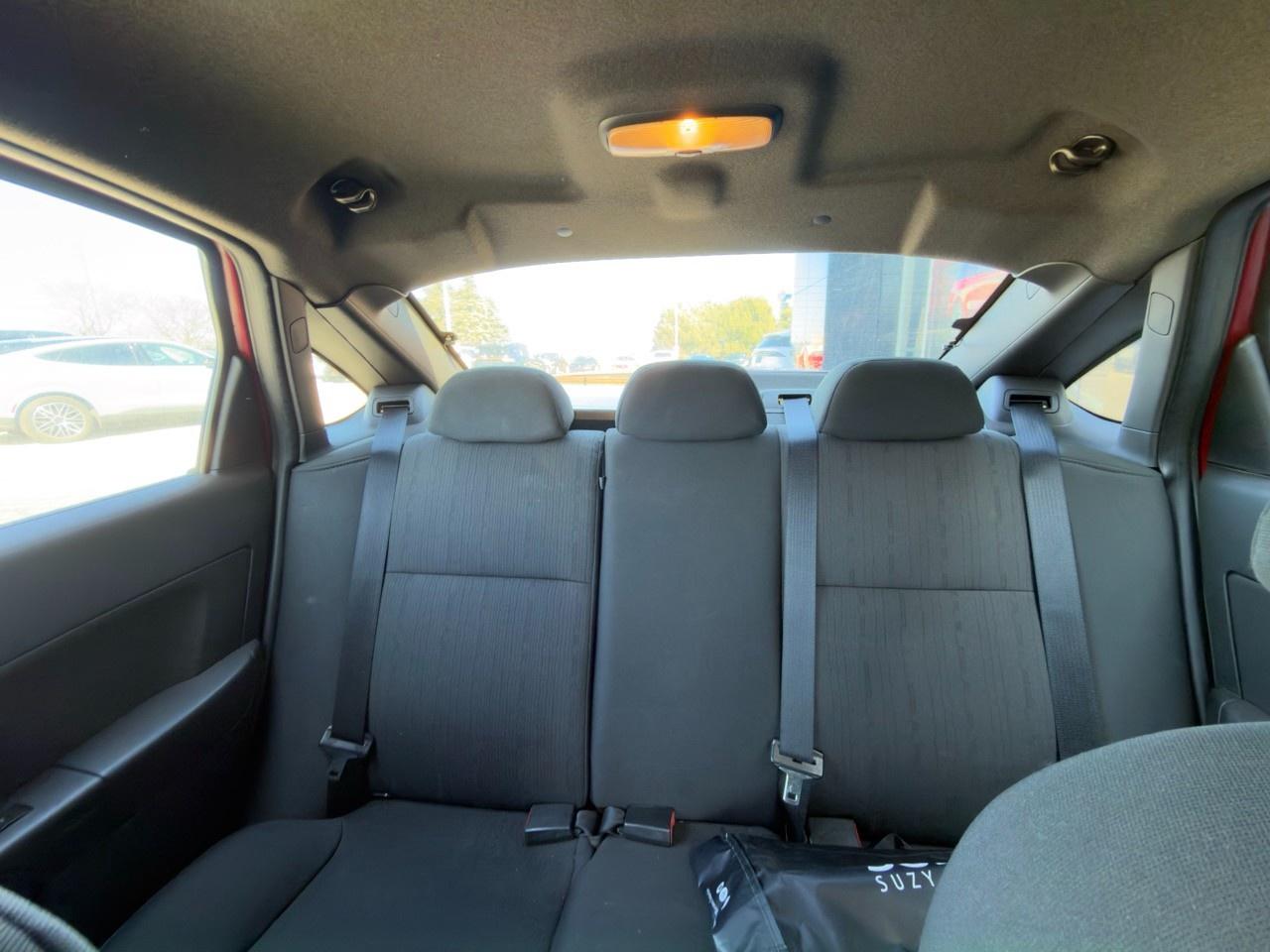 2010 Ford Focus SANGRIA RED METALLIC | CHARCOAL BLACK CLOTH SEAT TRIM | 2.0L DOHC I4 DURATEC ENG | 4-SPEED A/T W/OD Photo