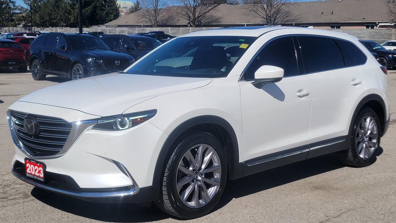 Check out this stylish and spacious 2023 Mazda CX-9 GT AWDthe perfect blend of performance, luxury, and practicality for families or anyone who loves a refined driving experience.<br><br>With just 75,155 km, this well-maintained SUV delivers confidence on the road thanks to its AWD system and responsive 2.5L turbocharged engine, paired with a smooth 6-speed automatic transmission. Whether youre commuting or heading out on a weekend getaway, the CX-9 offers a comfortable and capable ride in all conditions.<br><br>Finished in a clean white exterior, this GT trim brings premium features and upscale design throughout. Inside, youll enjoy a thoughtfully crafted cabin with high-end materials, advanced technology, and plenty of room for passengers and cargo.<br><br>Key Highlights:<br><br>All-Wheel Drive (AWD) for year-round confidence<br><br>Turbocharged performance with excellent efficiency<br><br>Spacious 3-row seatingperfect for families<br><br>Premium GT trim with upscale interior finishes<br><br>Smooth and reliable 6-speed automatic transmission<br><br>This CX-9 GT is the ideal SUV for those who want versatility without sacrificing comfort or style.<br><br>?? Dont miss outcontact us today to book your test drive!