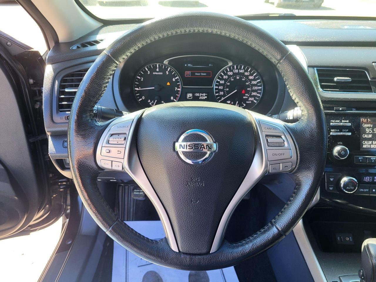 2014 Nissan Altima 4dr Sdn I4 CVT 2.5 SL Photo