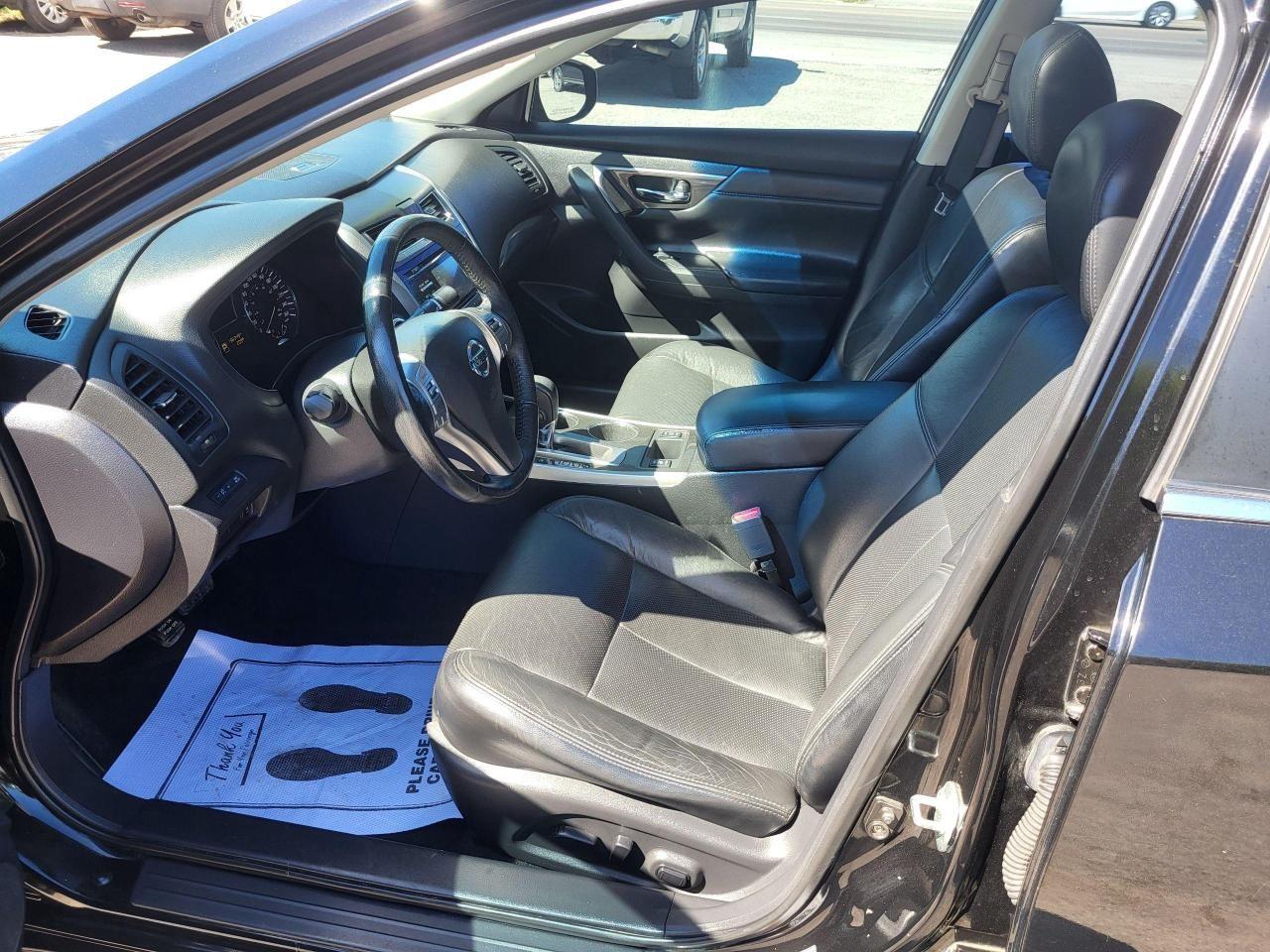 2014 Nissan Altima 4dr Sdn I4 CVT 2.5 SL Photo