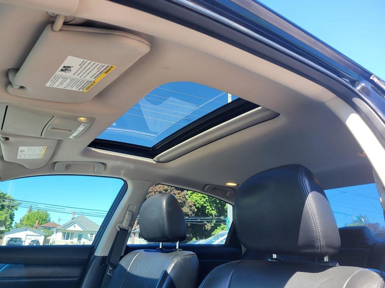 2014 Nissan Altima 4dr Sdn I4 CVT 2.5 SL Photo