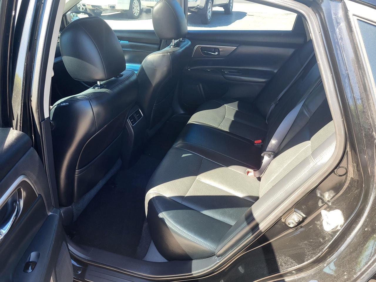 2014 Nissan Altima 4dr Sdn I4 CVT 2.5 SL Photo