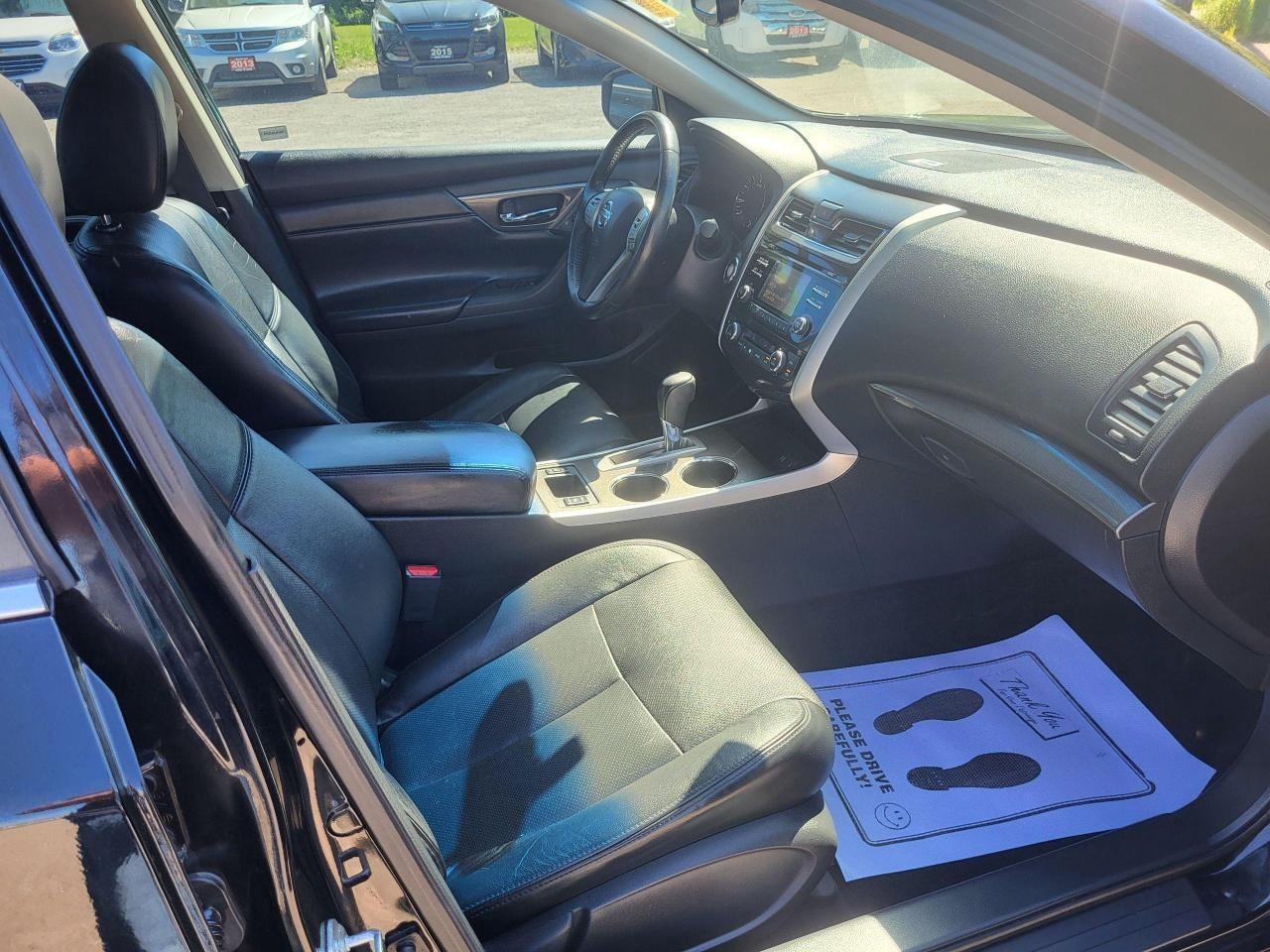 2014 Nissan Altima 4dr Sdn I4 CVT 2.5 SL Photo