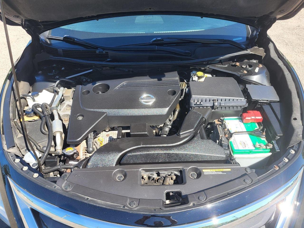 2014 Nissan Altima 4dr Sdn I4 CVT 2.5 SL Photo