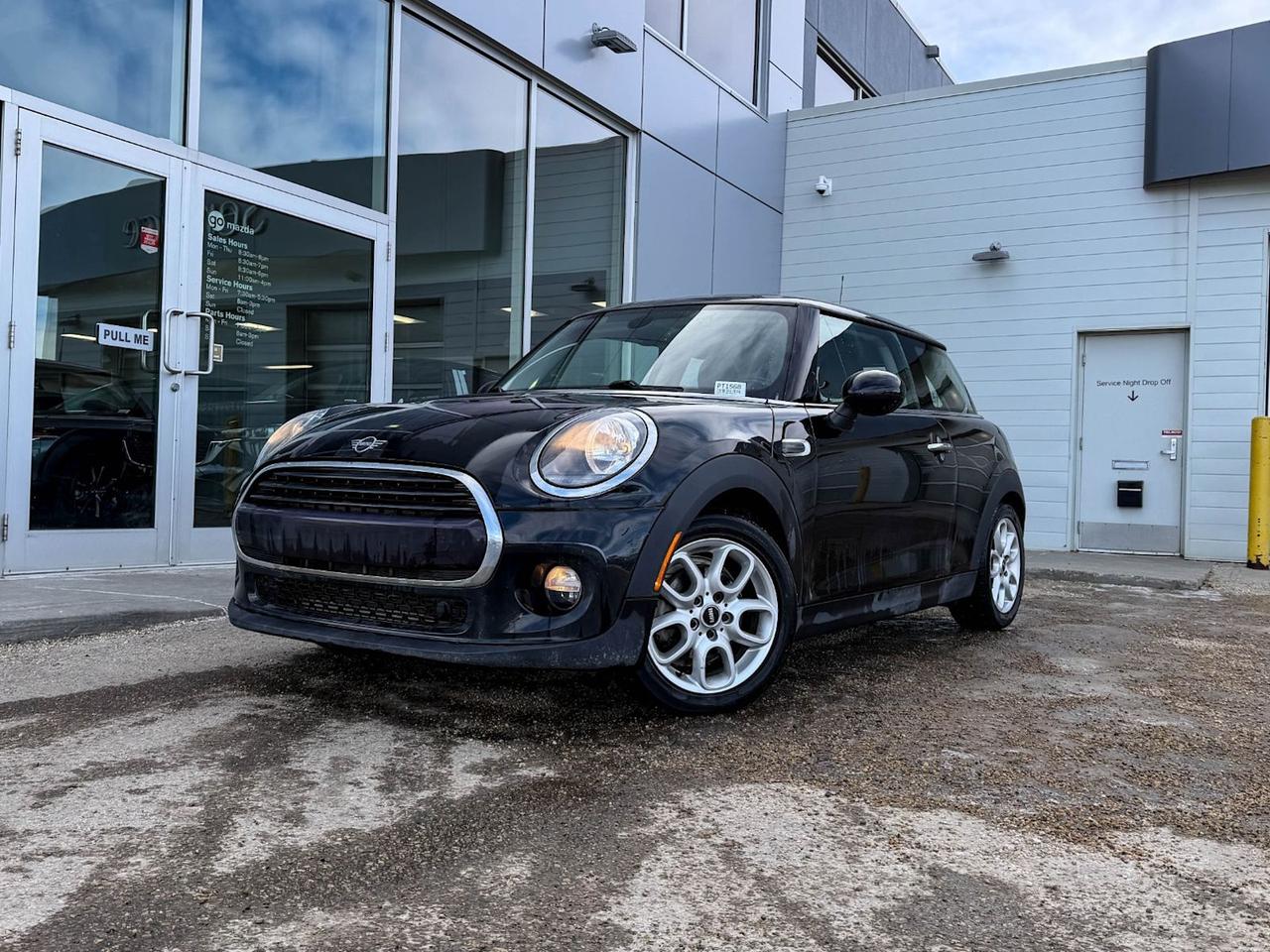Discover the fun and flair of the pre-owned 2019 MINI 3 Door Cooper, featuring a stylish Black exterior and a lively 1.5L Twin Power Turbo engine paired with a 6-speed manual transmission for an engaging driving experience. This nimble Cooper comes equipped with 16 Loop Spoke wheels, leatherette upholstery, and front bucket seats for comfort and style. Enjoy advanced connectivity with the MINI Connected app integration and a premium AM/FM stereo with satellite radio readiness. Safety is prioritized with 8 airbags and electronic stability control, while features like power door mirrors, heated side mirrors, and a rear cargo area with tie downs enhance convenience. With its iconic design and spirited performance, this MINI Cooper is ready to add excitement to your daily drive  schedule your test drive today!Go Mazda is an AMVIC licensed business.This vehicle has been registered in the province ofSaskatchewan