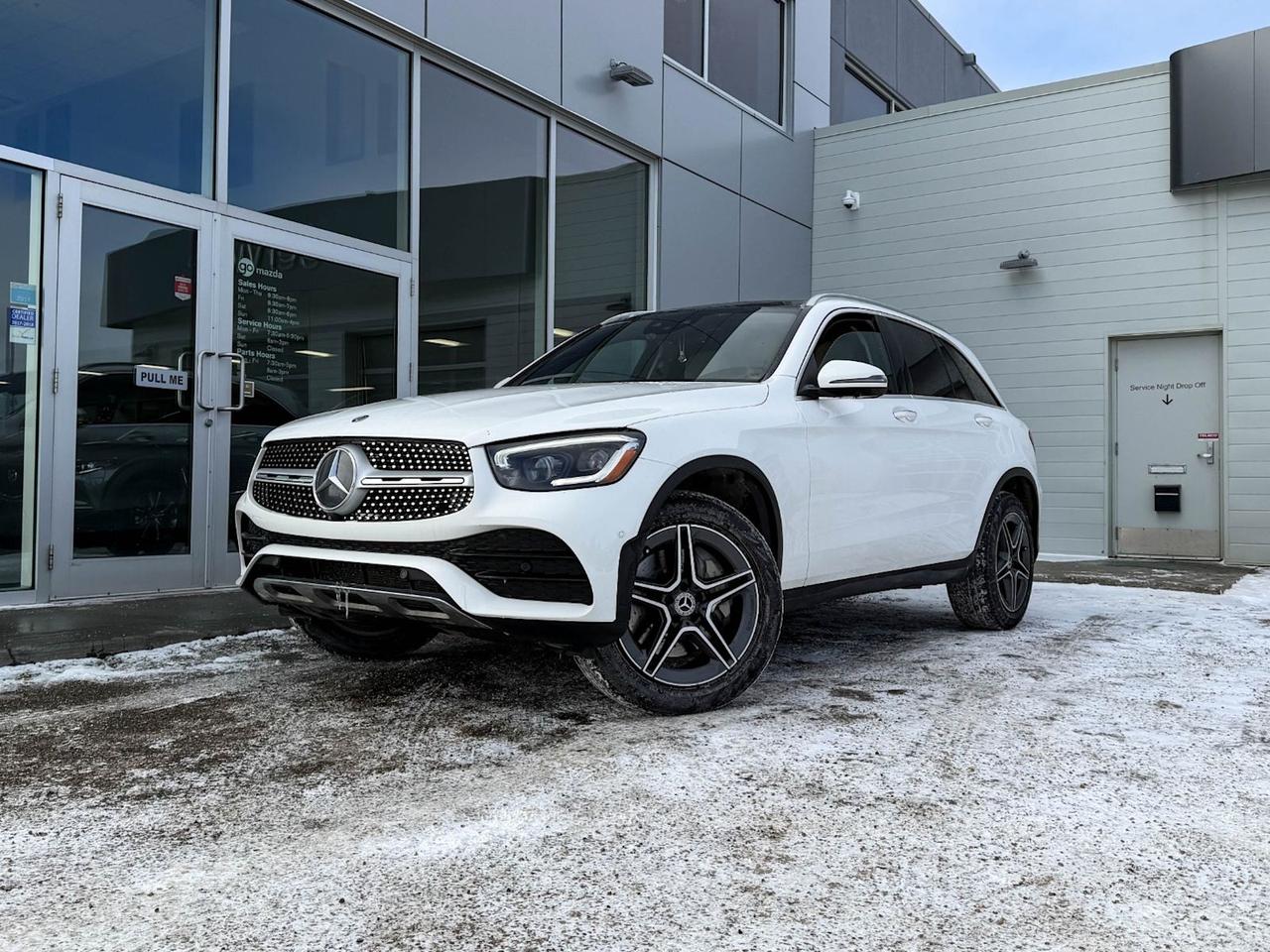 Discover luxury and performance in this pre-owned 2020 Mercedes-Benz GLC 300 4MATIC SUV in sleek White. Powered by a 2.0L Turbo 4-Cylinder engine paired with a smooth 9G-TRONIC automatic transmission, it offers confident all-wheel drive and advanced safety features including pedestrian impact prevention, driver attention alert, and multiple airbags.Step inside to heated front bucket seats with premium ARTICO upholstery and Fineline Dark Brown wood trim. Stay connected with the Connect 20 AM/FM Bluetooth radio, Apple CarPlay, 5 USB ports, and smart device mirroring on the intuitive touchscreen display. Dual-zone automatic climate control and a refrigerated glovebox keep every ride comfortable.Equipped with 19 all-season run-flat tires and alloy wheels, LED lighting, and a host of driver aids such as hill start assist, electronic stability control, and adaptive cruise control, this GLC 300 delivers an exceptional blend of style, comfort, and technology.Make this refined and capable SUV yours todayexperience the perfect balance of luxury and performance Mercedes-Benz is known for! Contact us to schedule your test drive.Go Mazda is a AMVIC licenced buisnessClean CarFax