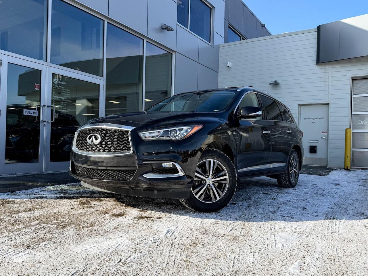 Experience luxury and versatility with this pre-owned 2020 INFINITI QX60 Essential AWD in sleek Black. Powered by a smooth 3.5L V6 Direct Injection engine paired with a CVT for seamless driving, this SUV combines performance with efficiency. Enjoy premium features like Infiniti InTouch with Navigation, a Bose 13-speaker audio system, and climate-controlled front seats for ultimate comfort. The spacious 7-passenger interior offers high-contrast leatherette seating, dual sunroofs, and advanced safety with active blind spot, lane departure prevention, and front/rear parking sensors. With AWD capability, all-speed ABS, and an intuitive driver selectable drivetrain mode, the QX60 is ready for any road or weather. Elevate your daily drive with this loaded INFINITIluxury, tech, and safety all in one stylish package. Contact us today to schedule your test drive!Go Mazda is a AMVIC licenced businessClean CarFax