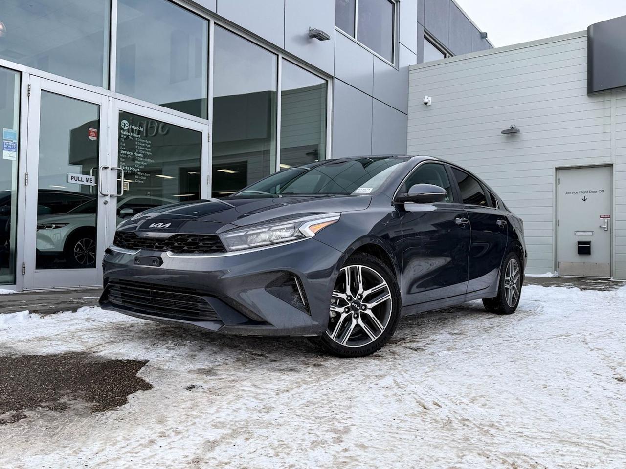 Discover exceptional value and style with this pre-owned 2023 Kia Forte EX IVT in sleek Gray. This compact sedan combines fuel-efficient CVT performance with advanced driver-selectable modes for a smooth, responsive ride. Enjoy comfort in heated front seats with 8-way power driver adjustments and ventilated seating, complemented by a leather-wrapped sport steering wheel and ambient lighting.Stay connected and in control with the 10.2-inch touchscreen display featuring integrated navigation, smart device mirroring, and wireless charging. Safety is top-notch with Forward Collision Mitigation, Lane Departure Prevention, Active Blind Spot System, and a rearview camera to keep you confident on every drive.Whether commuting or weekend cruising, the Forte EX offers dual-zone automatic climate control, a premium sound system, and ample cargo space with 60/40 folding rear seats. With a powerful suite of tech, comfort, and safety features, this Kia Forte EX IVT is ready to elevate your driving experience.Contact us today to schedule your test drive!Go Mazda is an AMVIC licensed businessThis vehicle has been registered in the province ofBritish Columbia